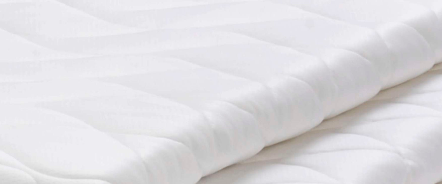 Hoito-ohje patjalle.