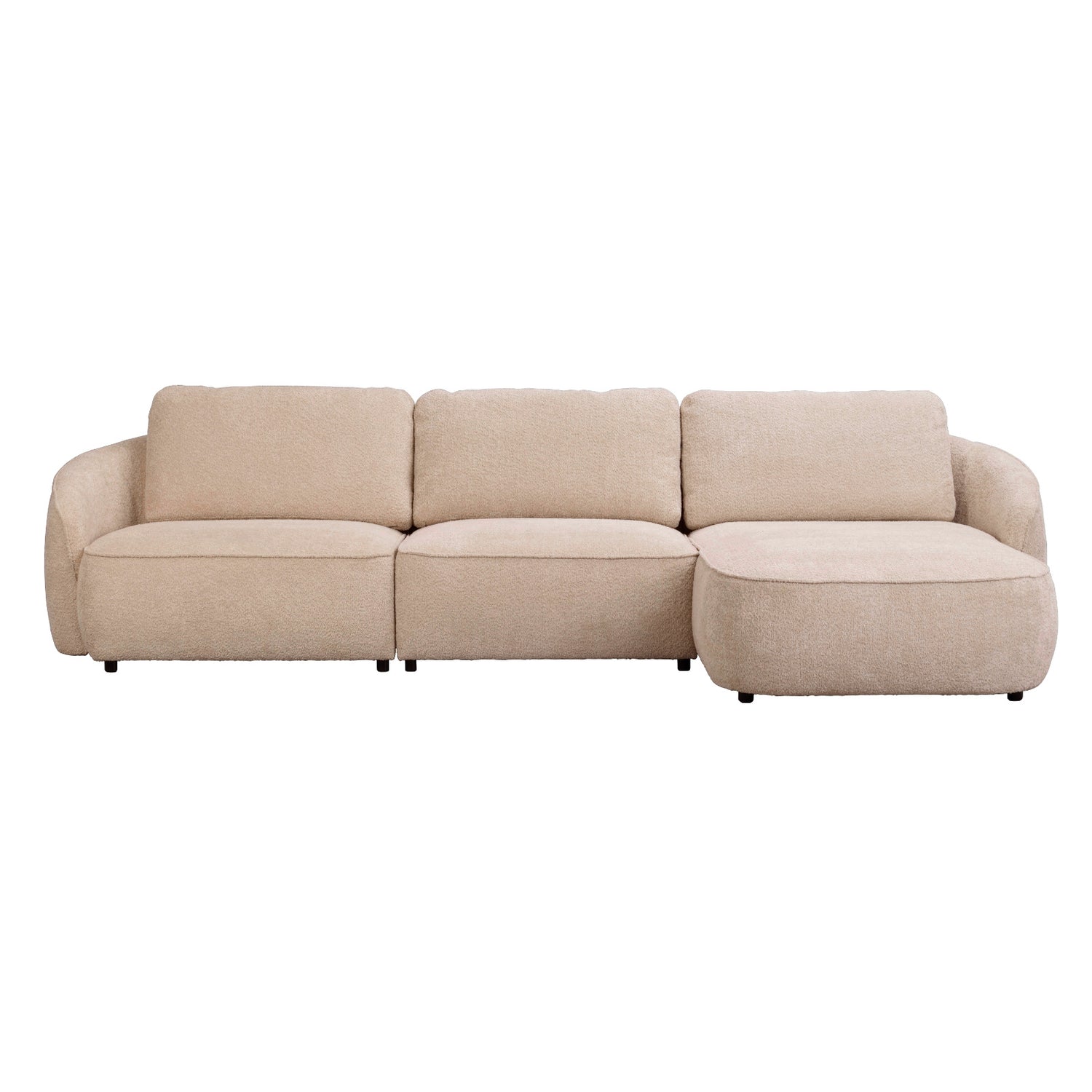 Vaalean beige Norris-divaanisohva oikeanpuoleisella divaanilla. Sohva on verhoiltu Chenillen kaltaisella Anna 2-kankaalla ja sohvassa on mustat 5 cm korkeat jalat.