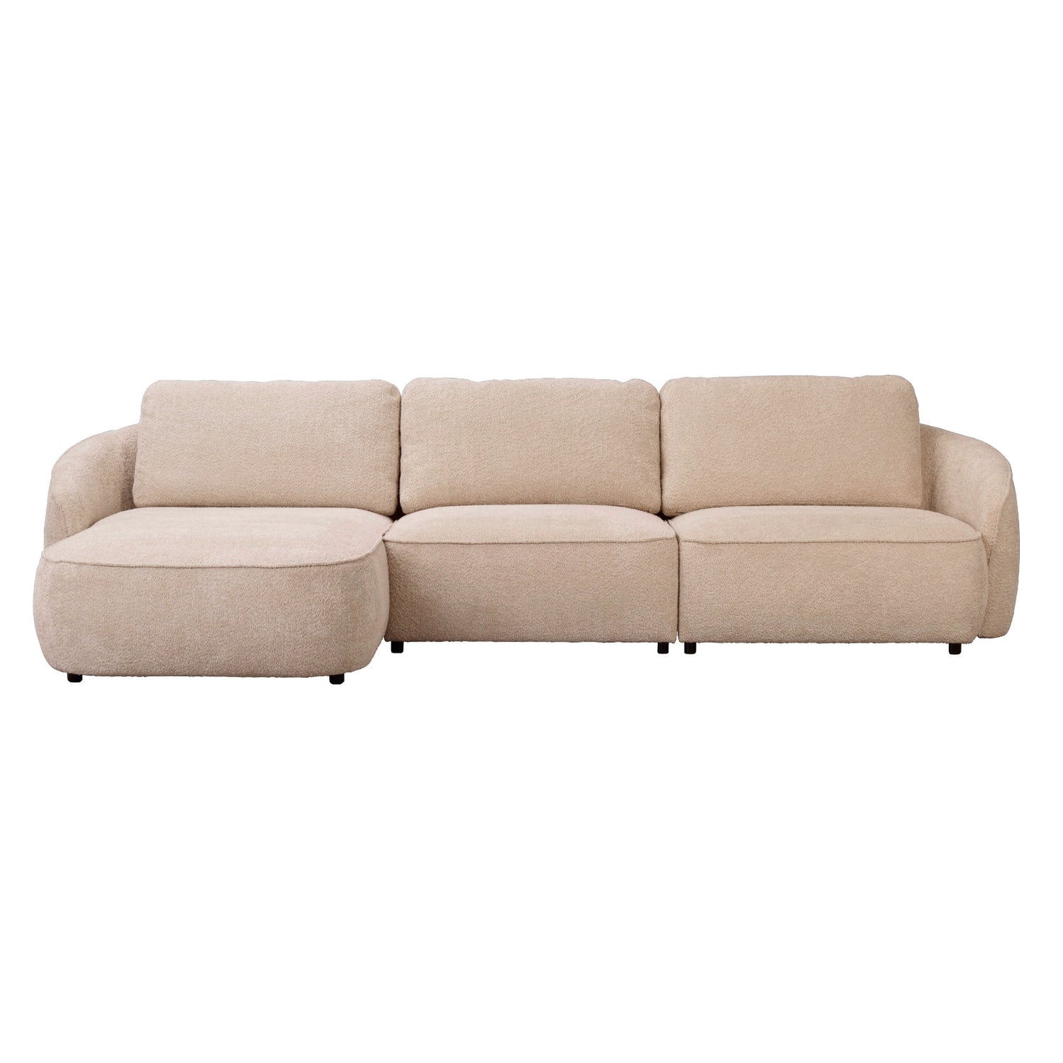 Vaalean beige Norris-divaanisohva vasemmanpuoleisella divaanilla. Sohva on verhoiltu Chenillen kaltaisella Anna 2-kankaalla ja sohvassa on mustat 5 cm korkeat jalat.