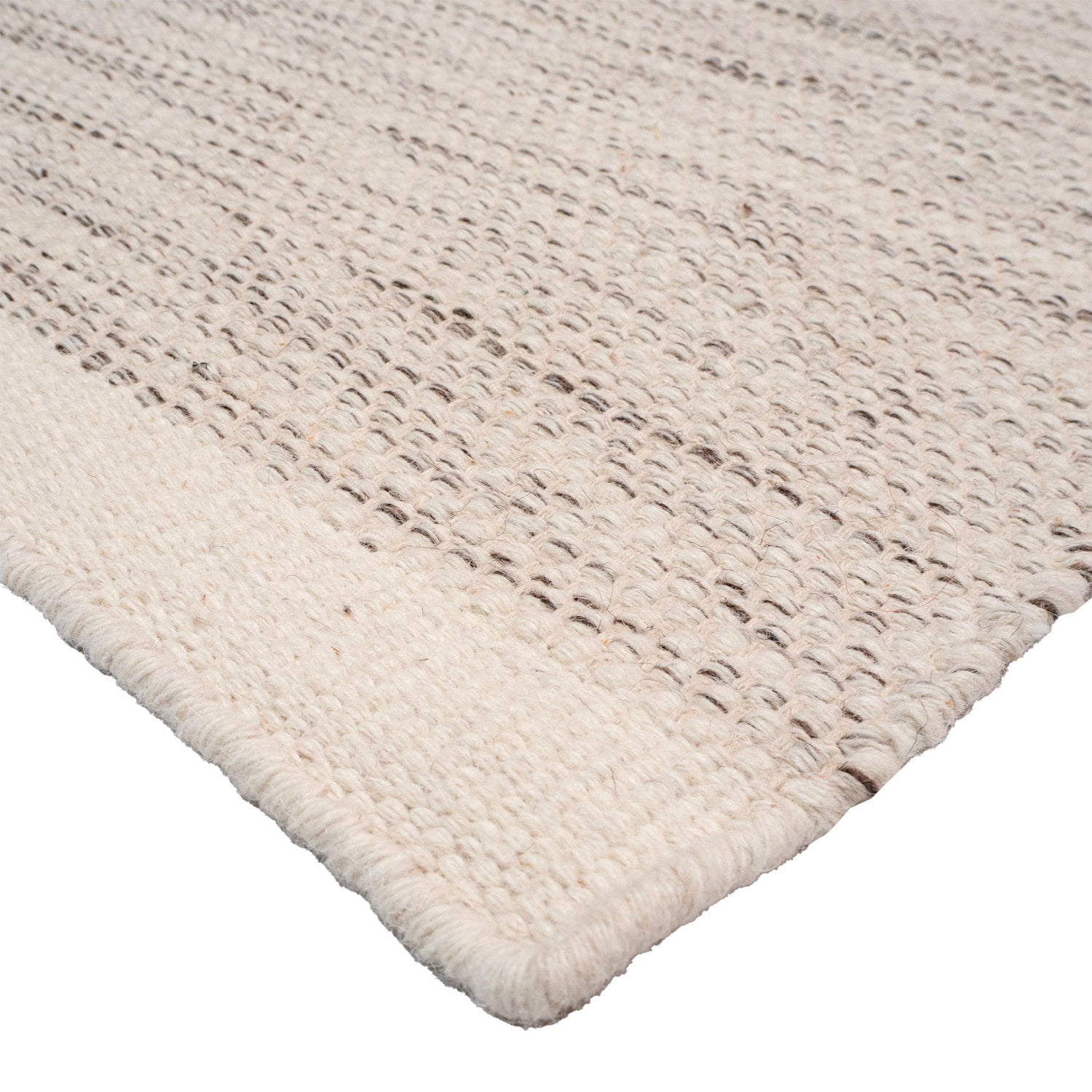 Lähikuvassa Aamu-villamatto luonnonvalkoisella kuosilla.