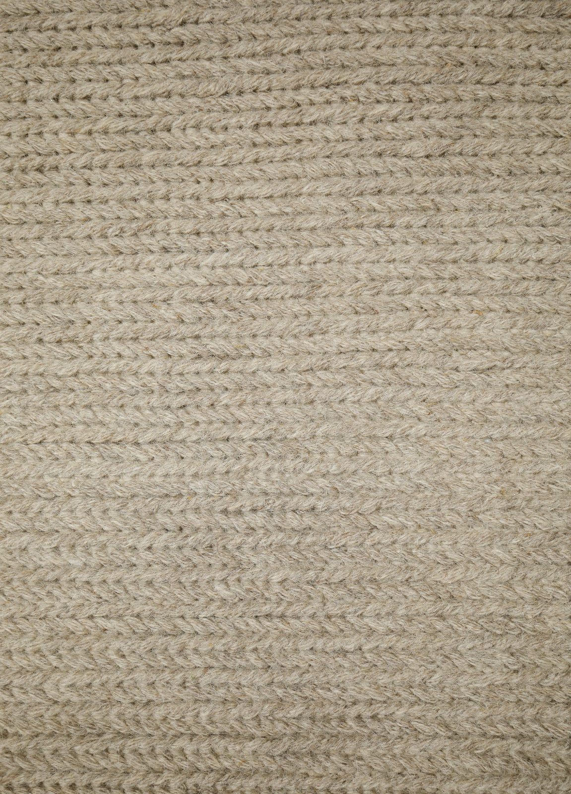 Anna-villamaton palmikkopintaa harmaana.