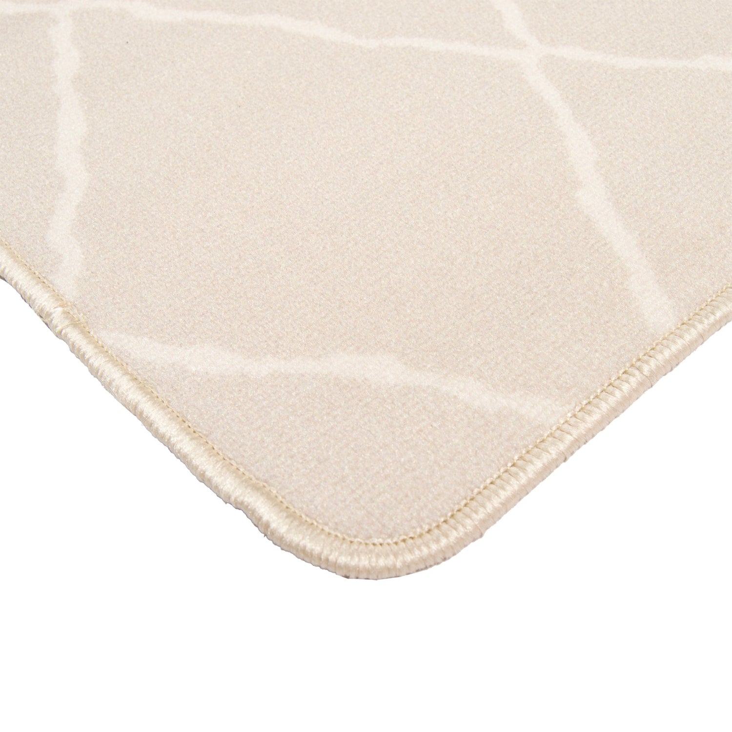 Lähikuvassa bukleepintainen Carlos-matto, beige valkoisilla salmiakkikuvioilla.