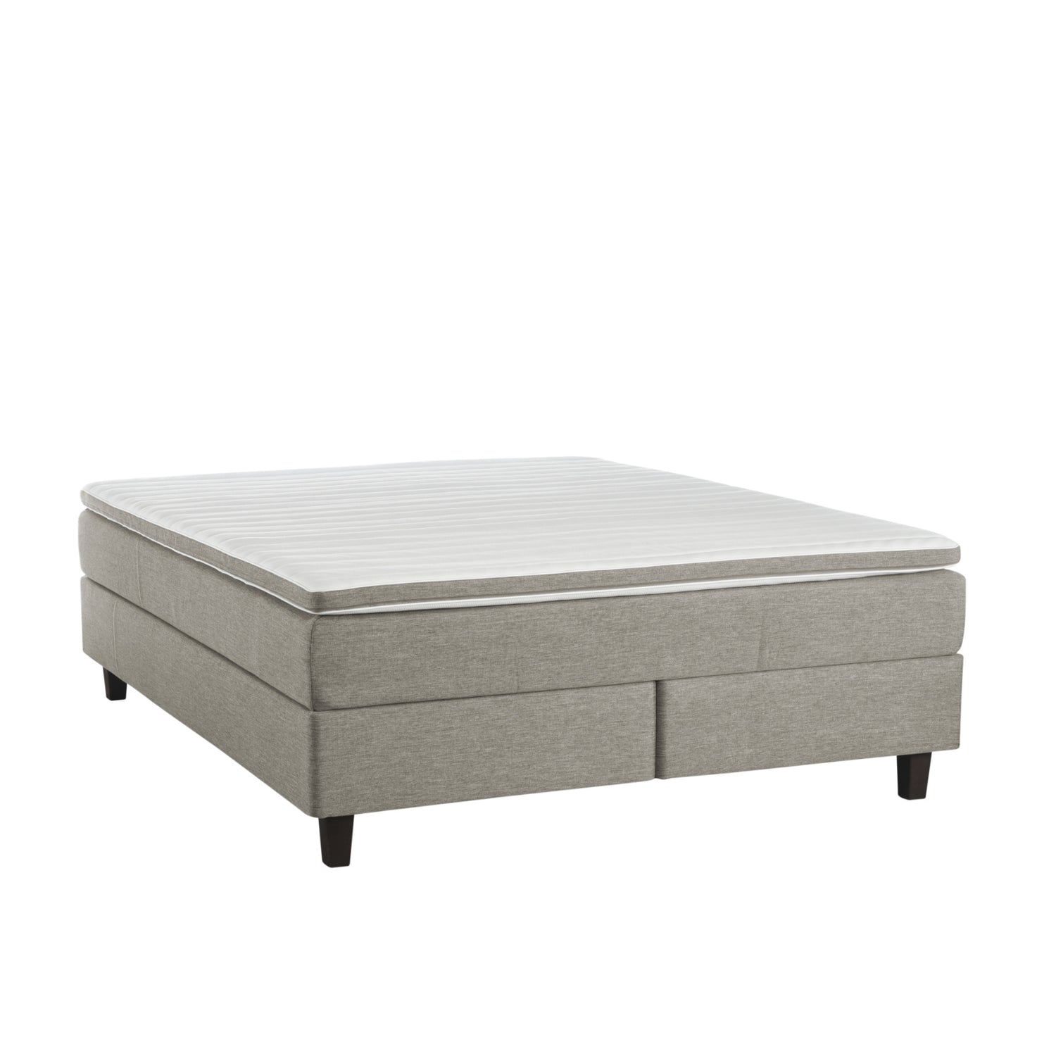 Hiekanvärinen Havu-jenkkisänkypaketti wengen värisillä Royal-jaloilla ja profiloidulla sijauspatjalla.