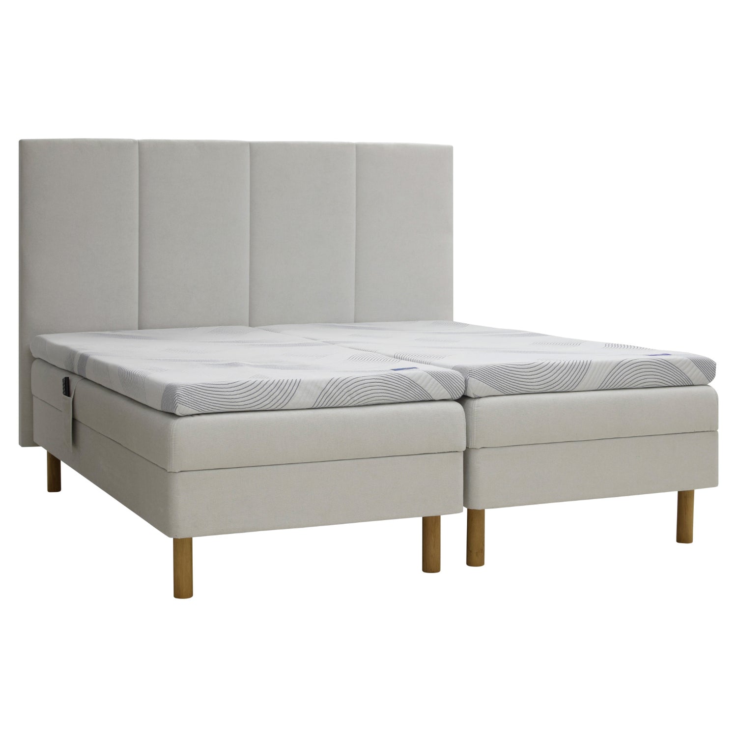 Kuvassa on beige Tunnel 01 -kangasverhoiltu Heaven By Unico Revive -moottorisänkypaketti. Pakettiin kuuluu 2 kpl Suomessa valmistettua, portaattomasti säädettävää Revive-moottorisänkyä, 2 kpl Revive 8 Nano Cool™-verhoiltua Memory -ergosijauspatjaa sekä pyöreät tammenväriset puujalat. Kuvan sängynpääty myydään erikseen.