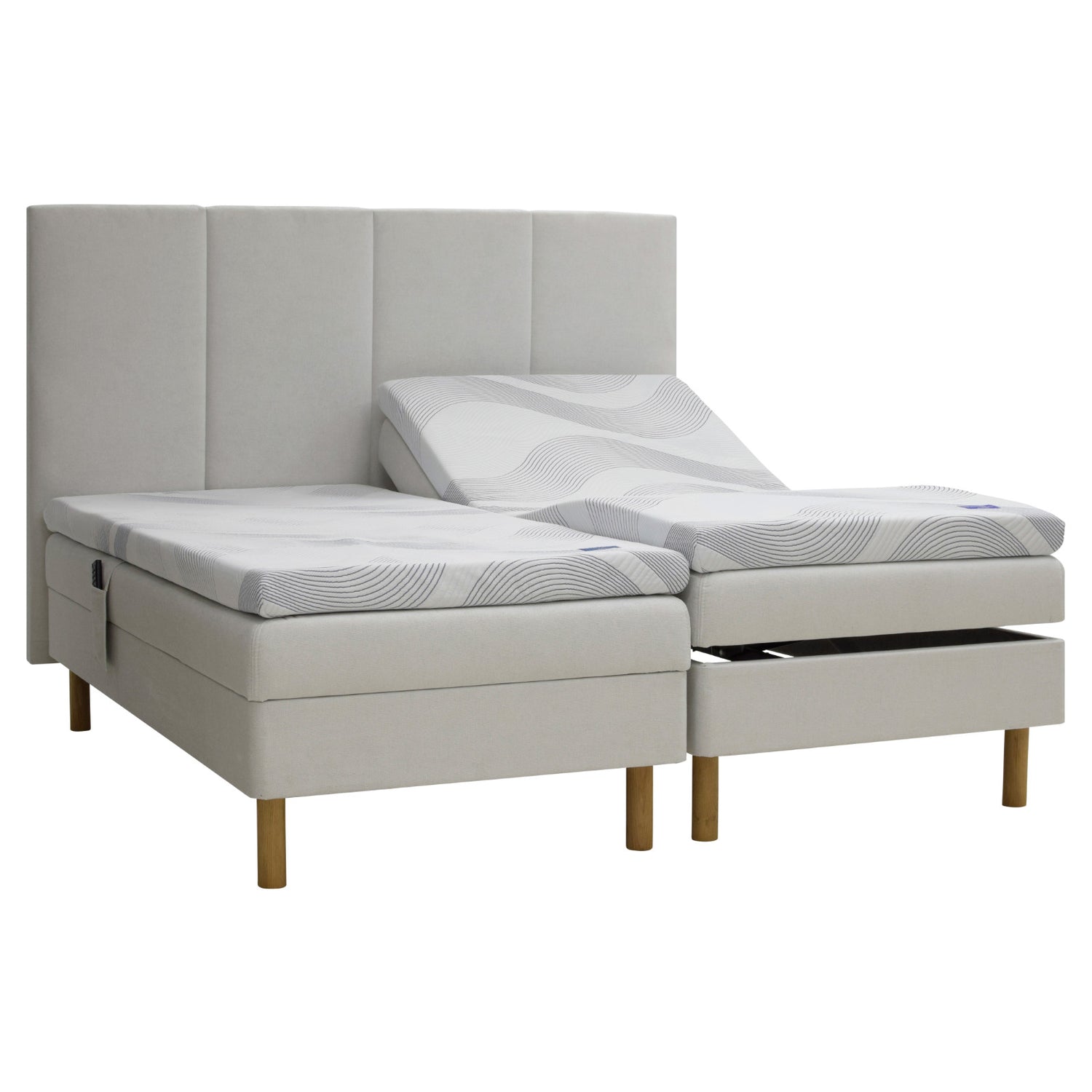 Beige Tunnel 01 -kangasverhoiltu Heaven By Unico Revive -moottorisänkypaketti. Pakettiin kuuluu 2 kpl Suomessa valmistettua, portaattomasti säädettävää Revive-moottorisänkyä, 2 kpl Revive 8 Nano Cool™-verhoiltua Memory -ergosijauspatjaa sekä pyöreät tammenväriset puujalat. Kuvan sängynpääty myydään erikseen.