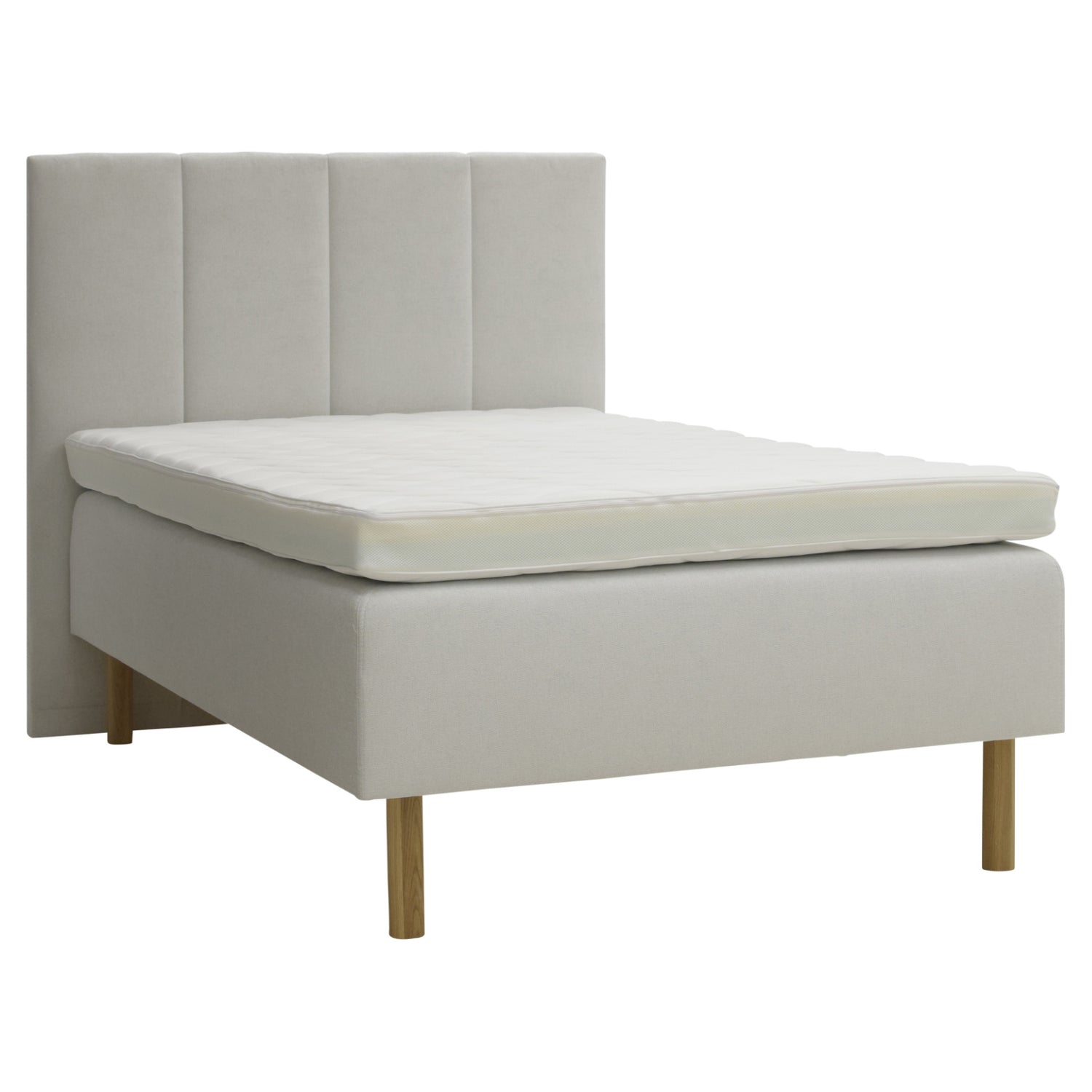 Kuvassa on beige Tunnel 01 -kangasverhoiltu Heaven By Unico Revive -runkosänkypaketti. Pakettiin kuuluu Revive-runkopatja ja yhtenäinen Revive 8 Nano Cool™-verhoiltu Memory -ergosijauspatja sekä pyöreät tammenväriset puujalat. Kuvan sängynpääty myydään erikseen.