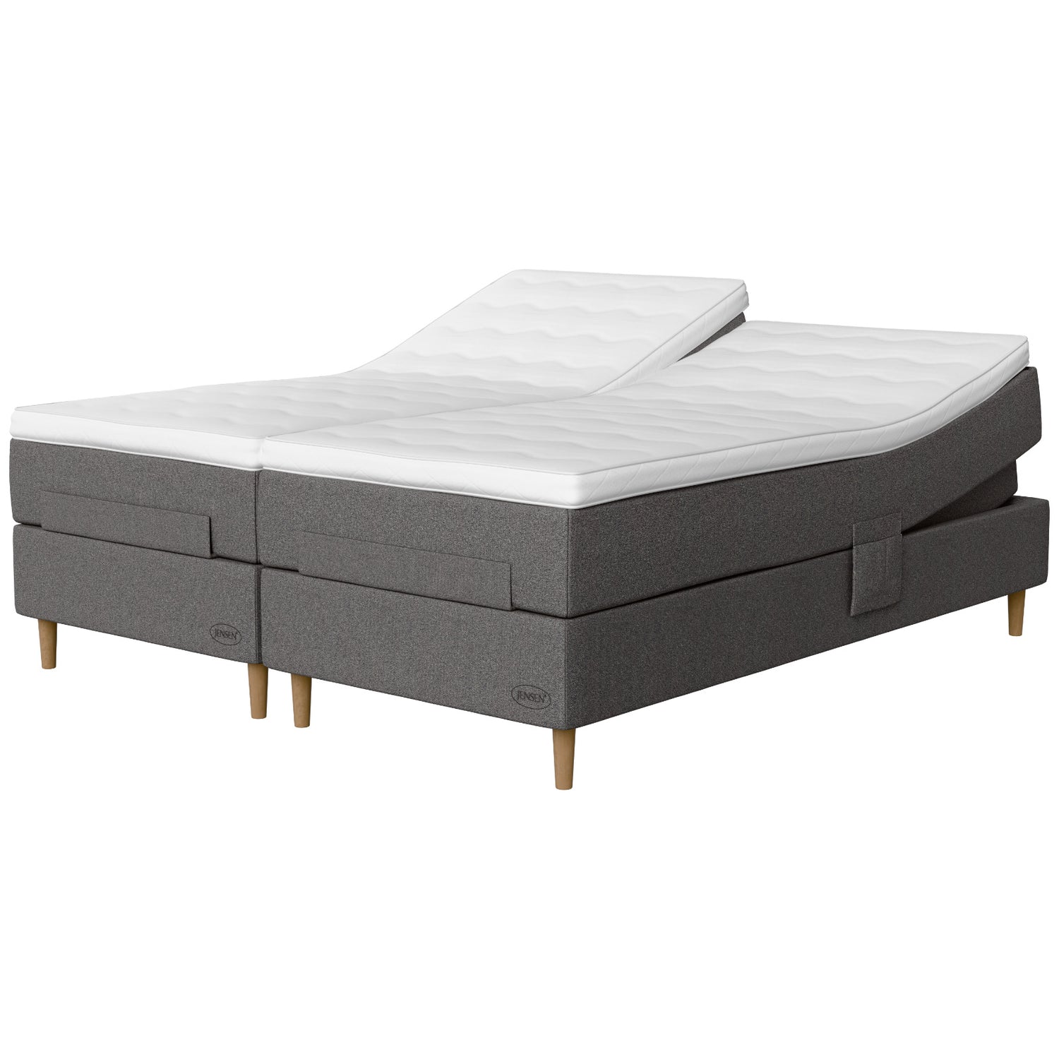 Jensen Opal -säätösängyn harmaa Grey 187 -verhoilu ja luonnonväriset 14 cm korkeat Conic-tammijalat. Sijauspatja ja jalat sisältyvät hintaan.