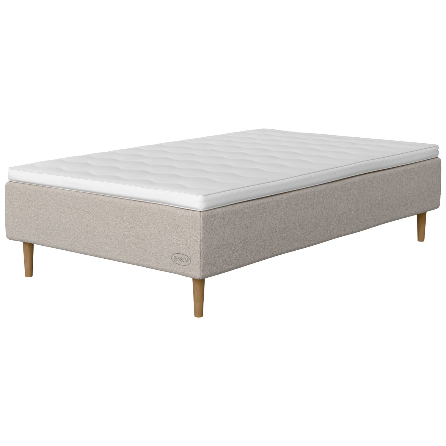 Jensen Opal -runkopatjasängyn hiekanvärinen Sand 185 -verhoilu ja luonnonväriset 18 cm korkeat Conic-tammijalat. Sijauspatja ja jalat sisältyvät hintaan.