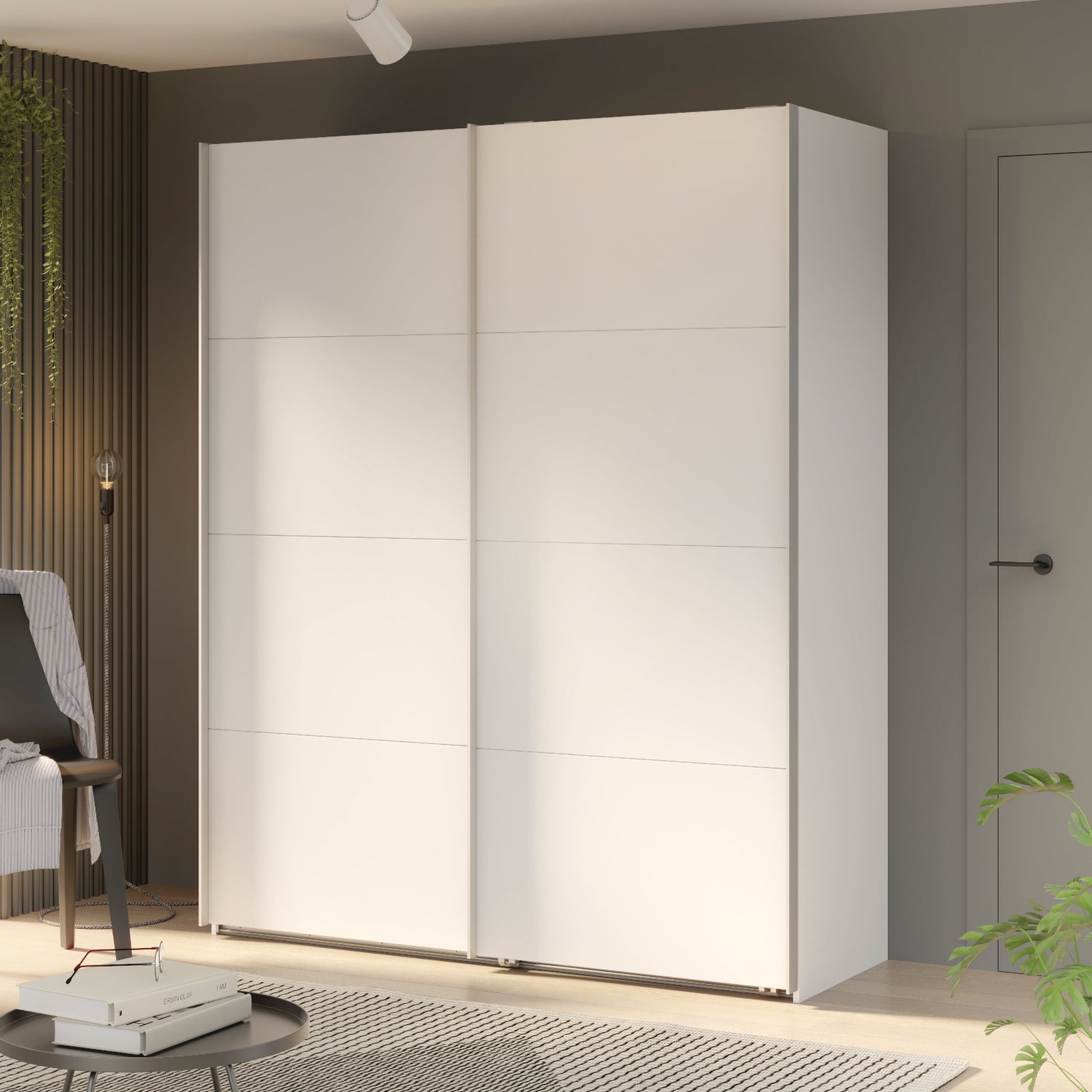 Kuvassa on mattavalkoinen 150 cm Kira-liukuovikomero. Sophisticspace-vetimet ovat metallia.