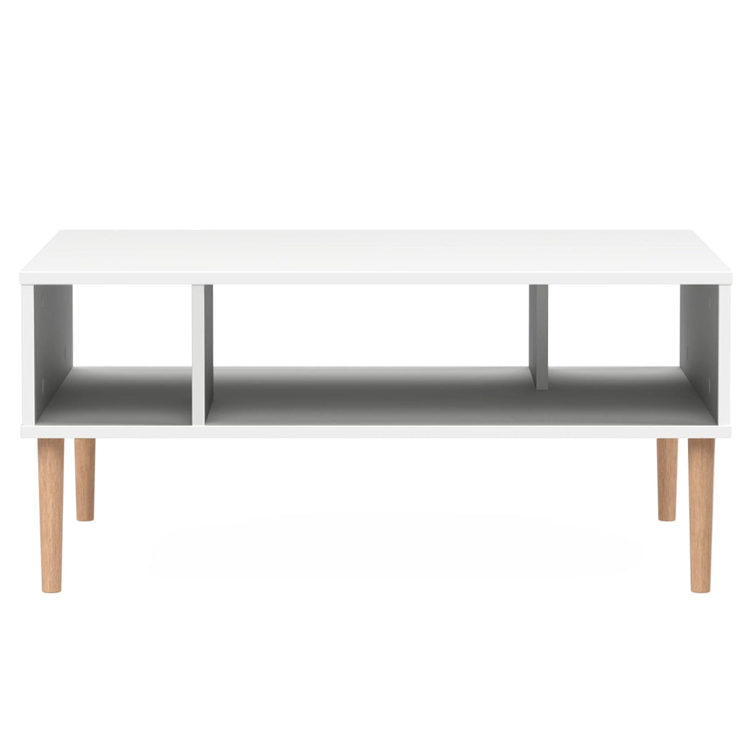 Kokovalkoinen Stemma-sohvapöytä luonnonvärisillä tammijaloilla.