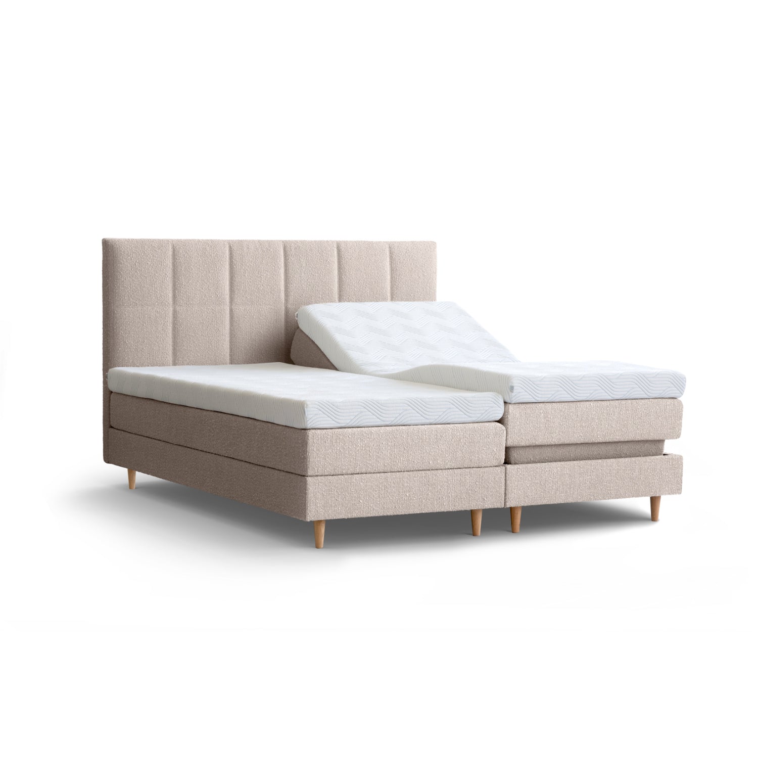 Tempur Break Adjustable -säätösänky beigenvärisellä verhoilulla ja tammijaloilla. Kuvan Tempur Break Square -sängynpääty myydään erikseen.