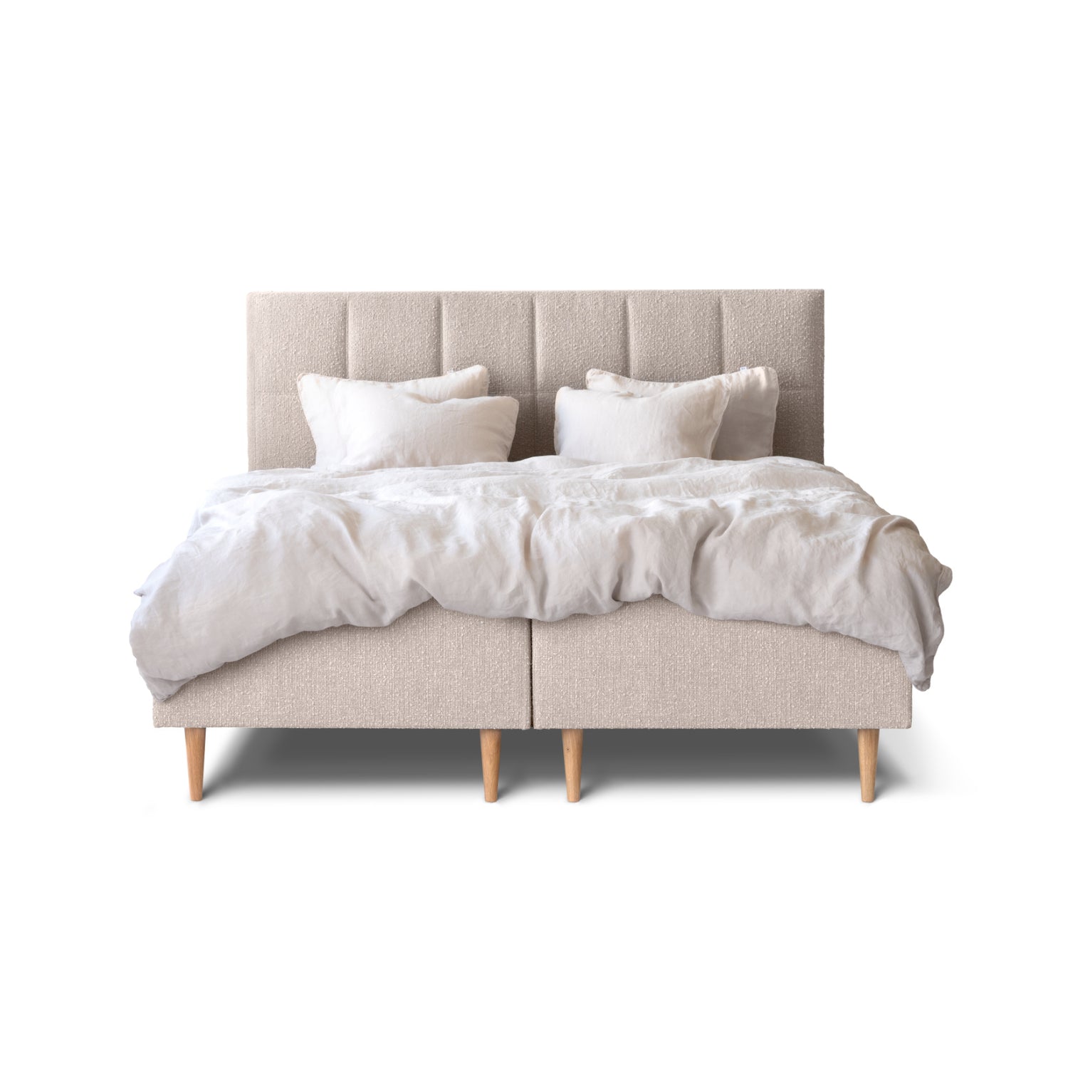 Tempur Break Box -runkosänkypaketti beigellä verhoilulla ja tammijaloilla. Kuvan Tempur Break Square -sängynpääty ja petivaatteet myydään erikseen.