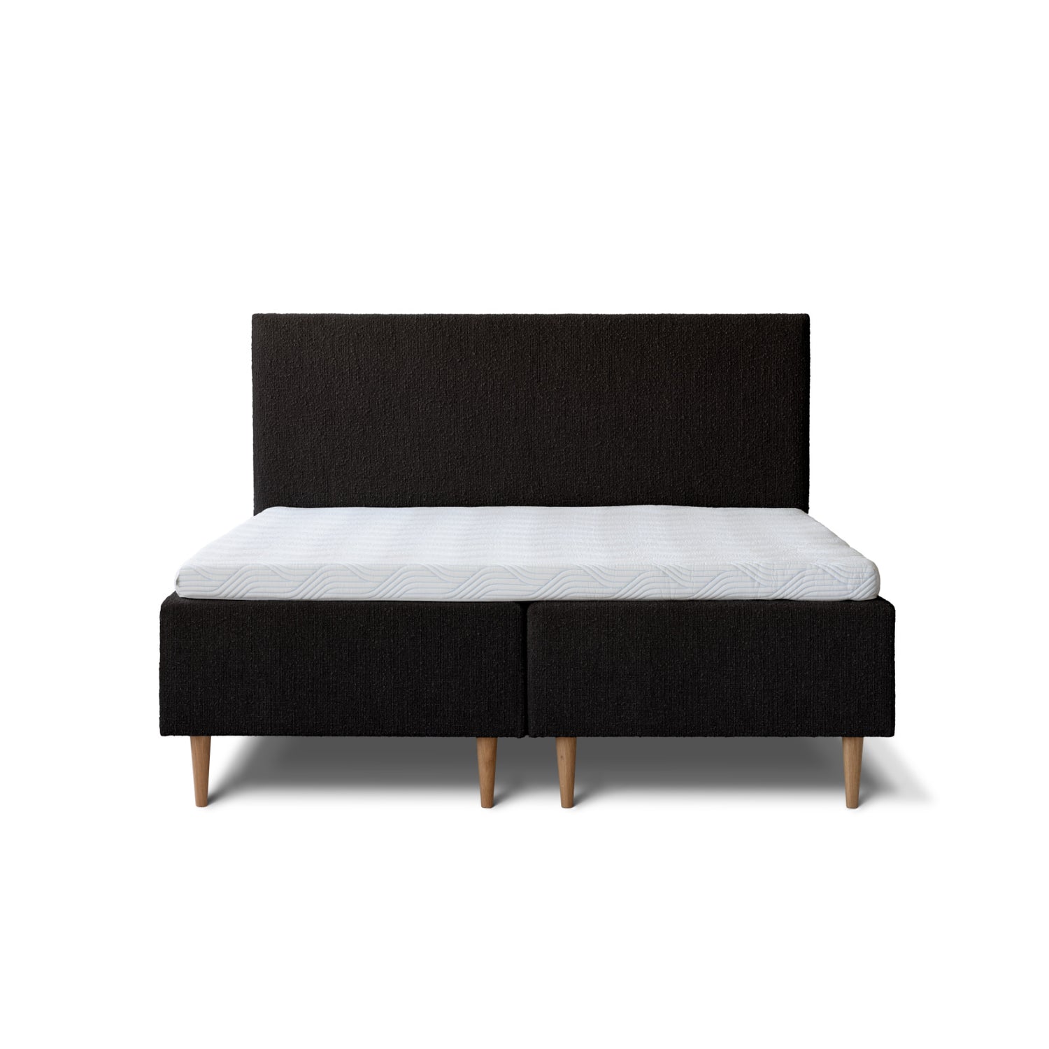 Tempur Break Box -runkosänkypaketti mustalla verhoilulla ja tammijaloilla. Kuvan Tempur Break Classic -sängynpääty myydään erikseen.