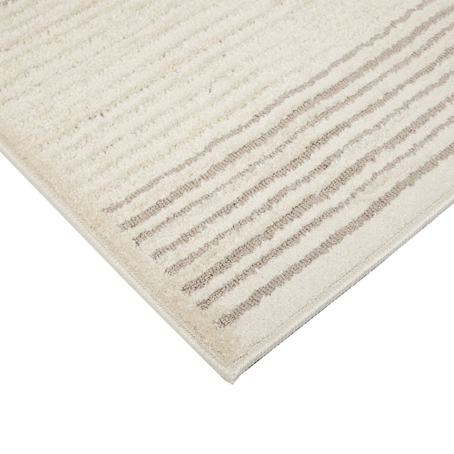 Lähikuvassa Taurus-nukkamaton kulma, beige kuosi.