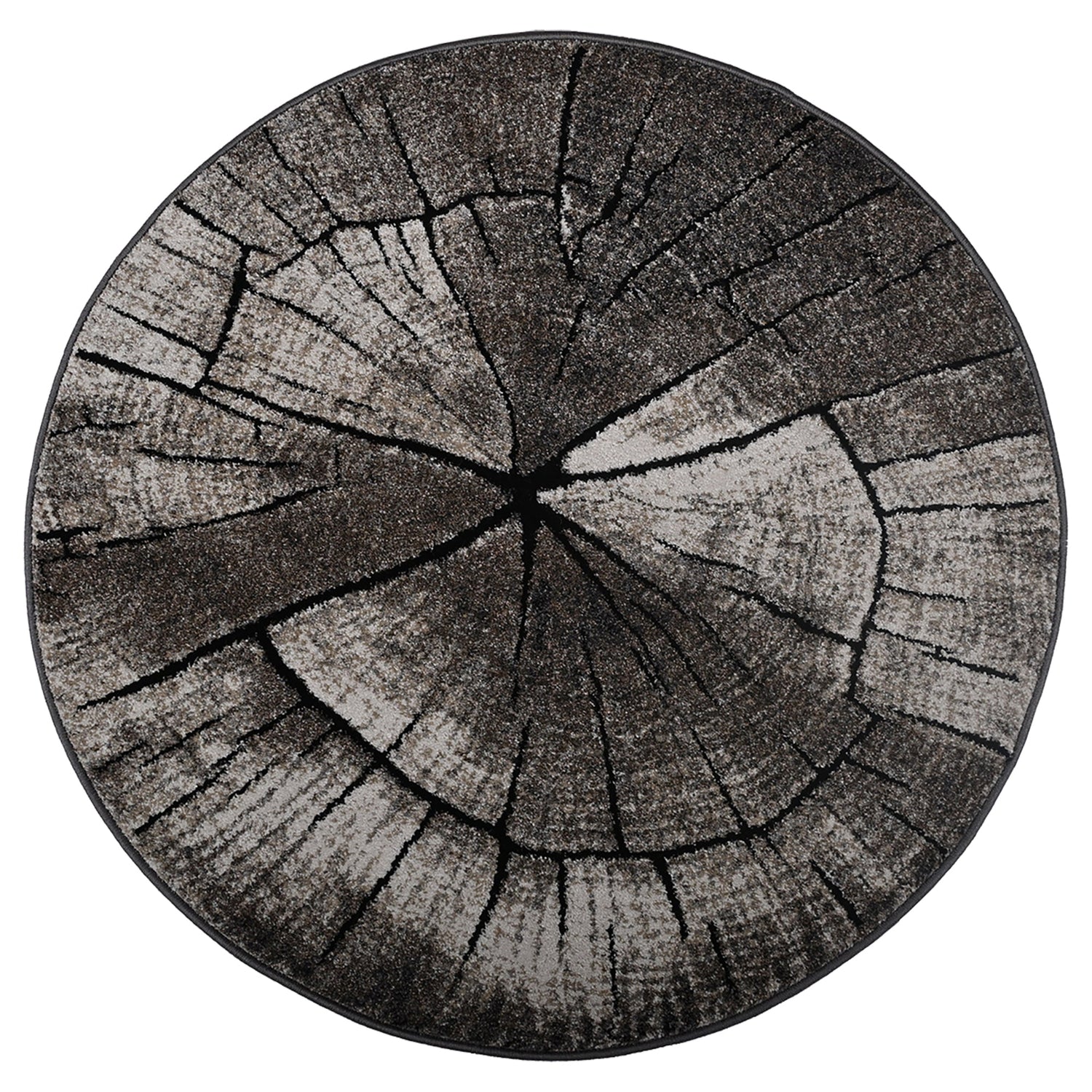 Pyöreä Timber-nukkamatto, harmaa. Maton näyttävä vuosirengaskuvio muistuttaa puun pintaa ja metsän harmonista tunnelmaa.
