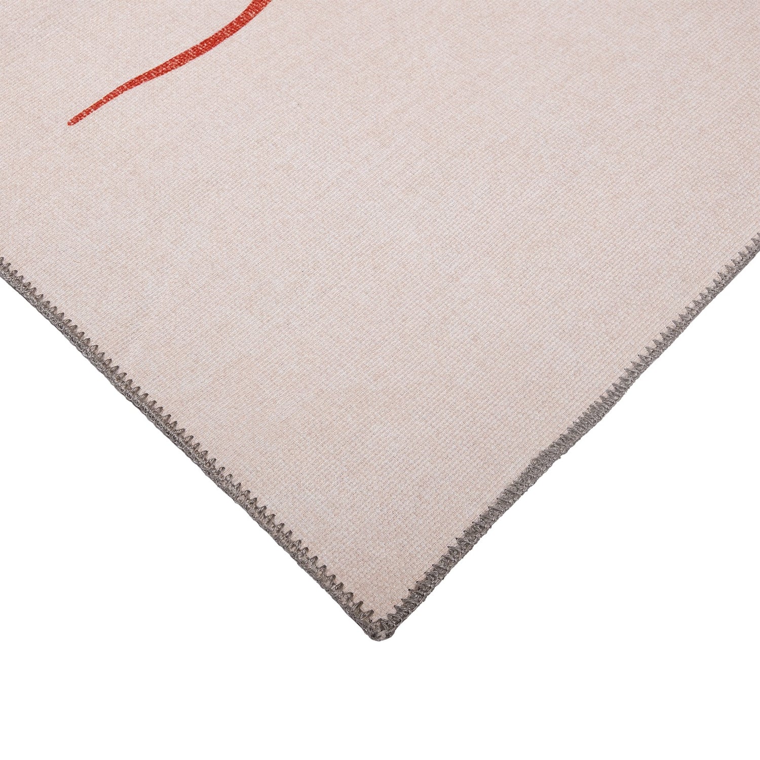 TUUMAUSTAUKO Muumi lasten matto, beige - materiaalin ja reunan detaljikuva.