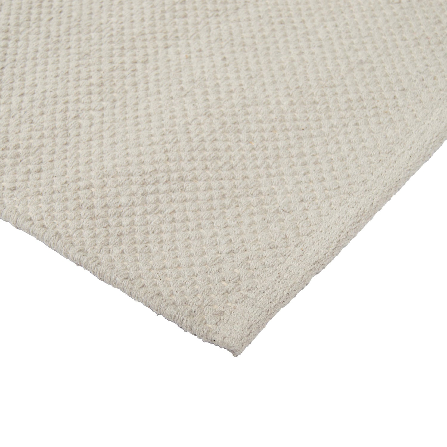 Lähikuvassa Ulappa-puuvillamatto, harmaa.