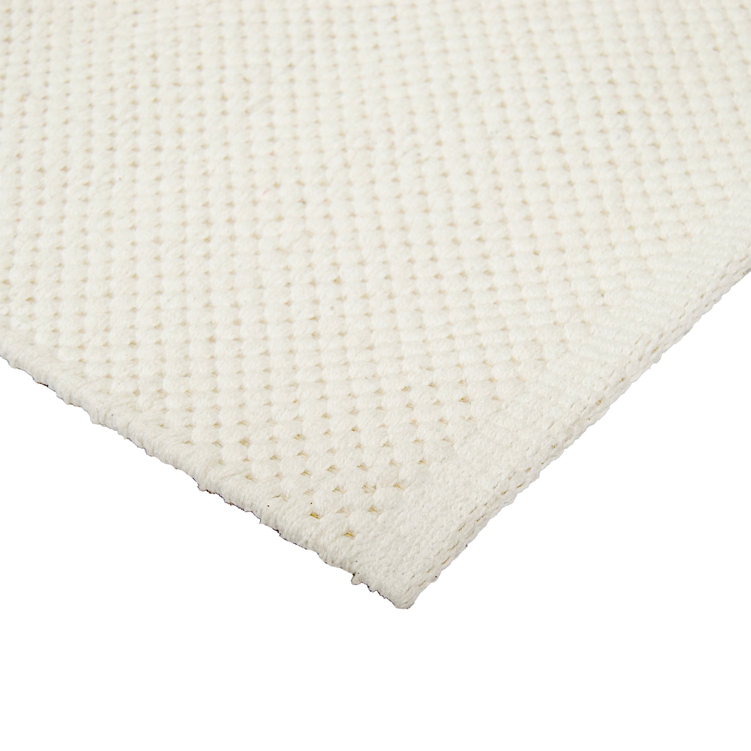 Lähikuvassa Ulappa-puuvillamatto, valkoinen.