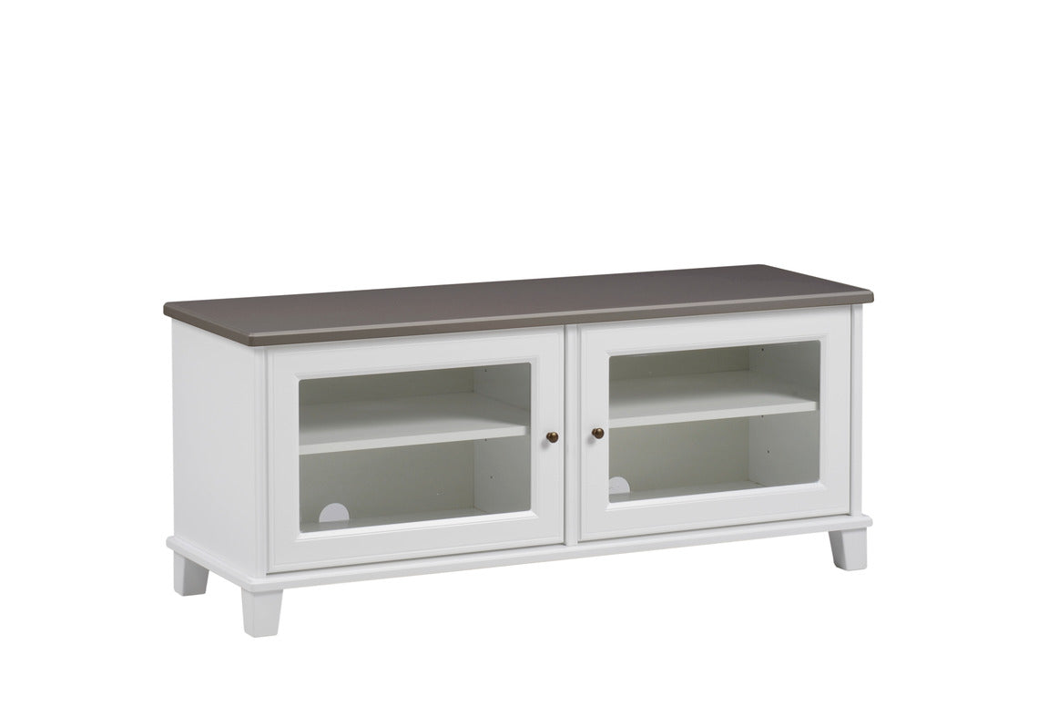 Valkoinen Aada tv-taso harmaalla kannella.