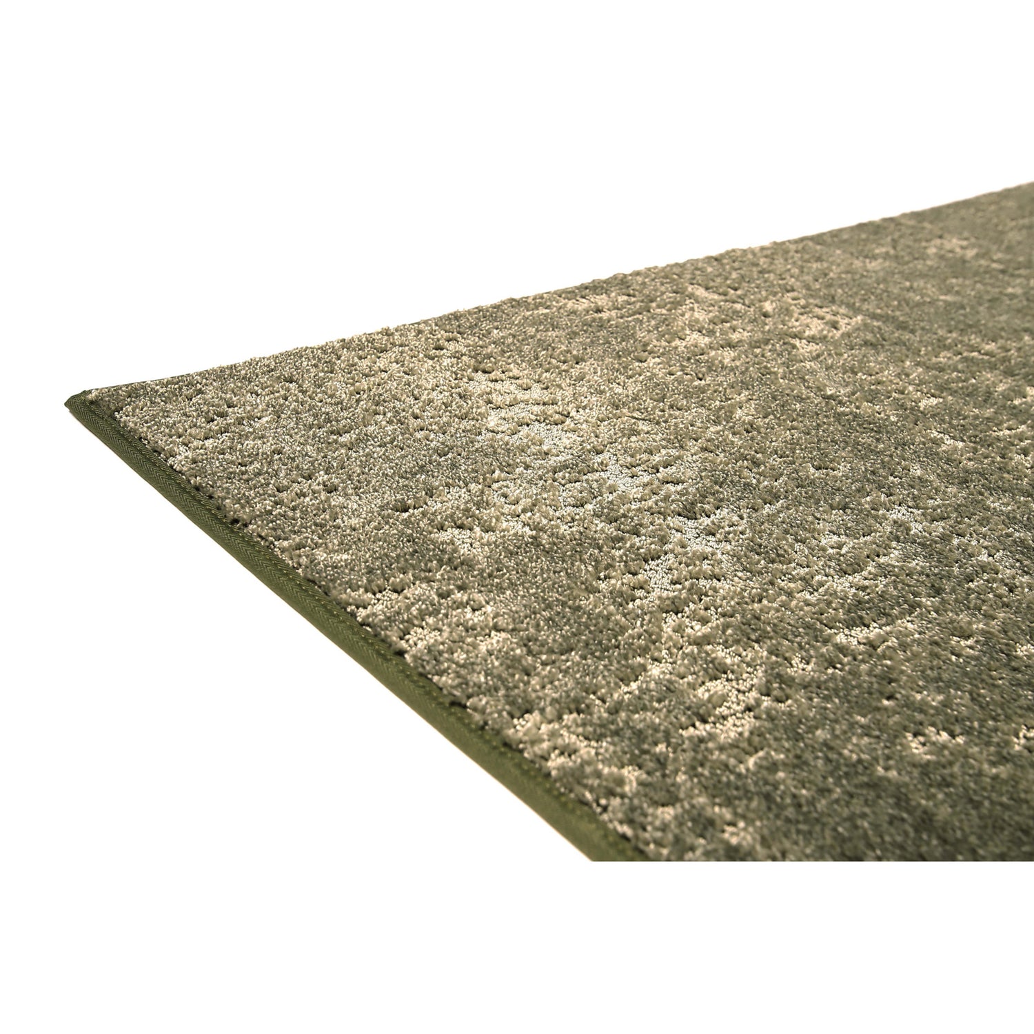 Basaltti-maton nukkapinta rakentuu auki leikatusta ja lenkkinukasta. Lähikuvassa vihreä Basaltti-matto.