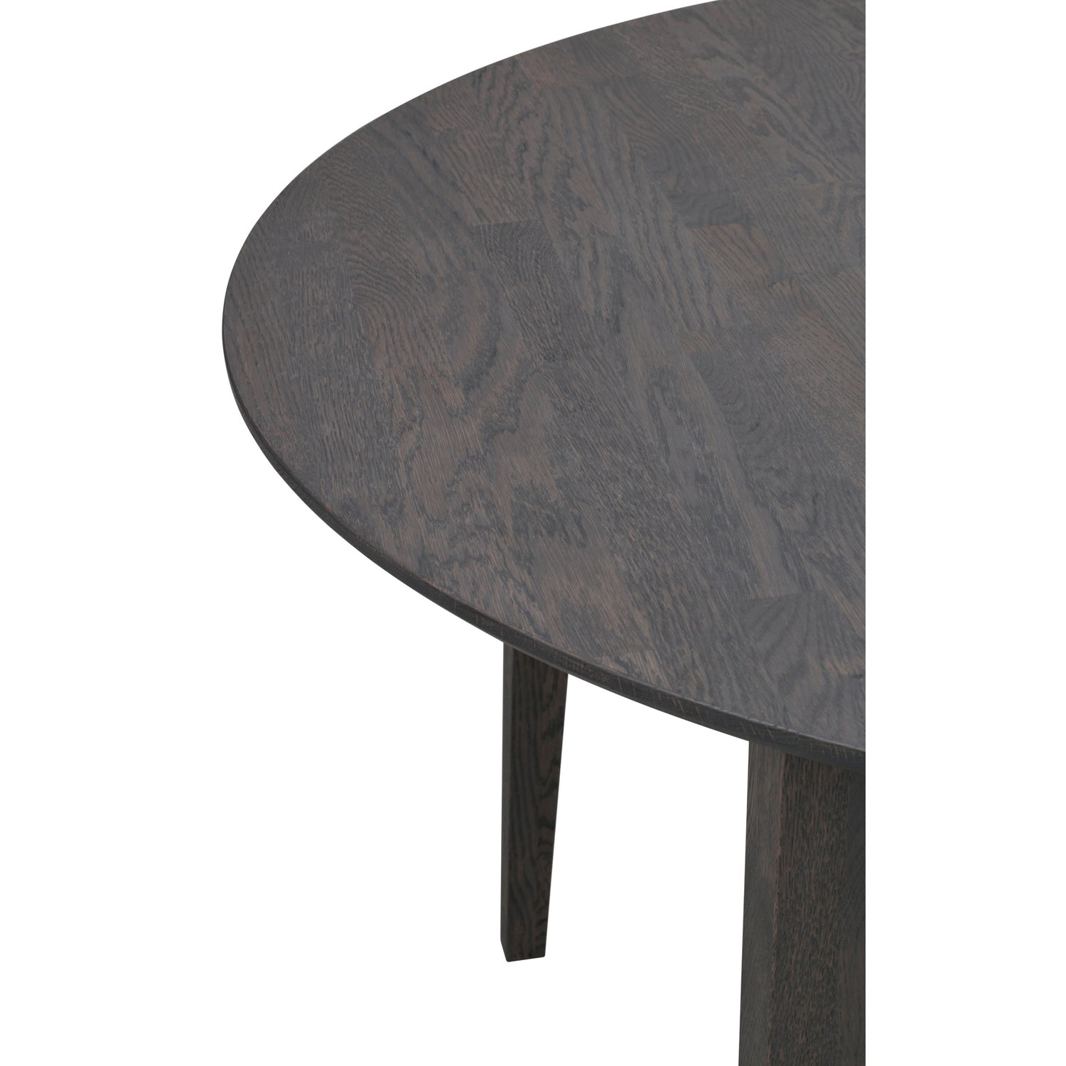 Lähikuvassa pyöreän Filippa-ruokapöydän savutammenväristä pintaa.