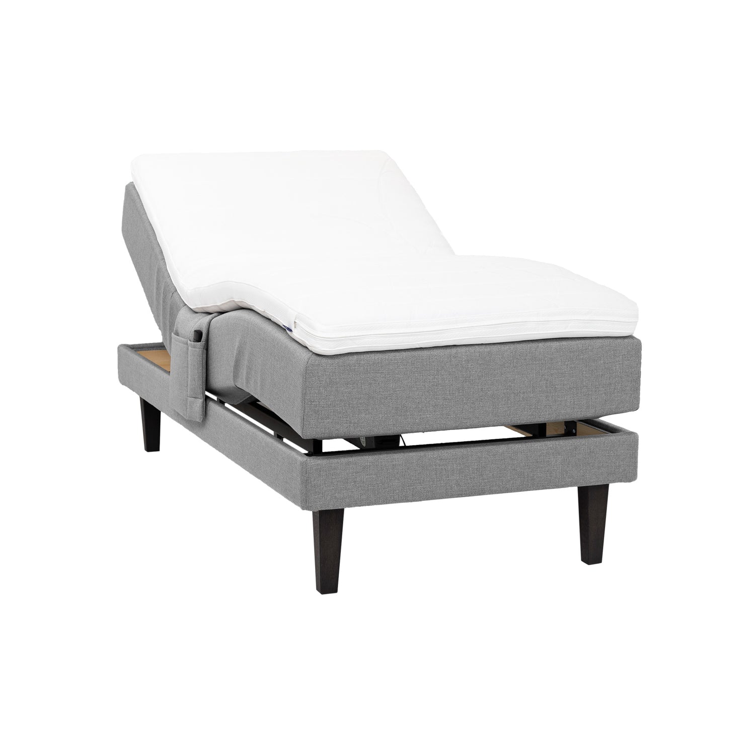 Harmaa Hilding Feel -moottorisänky 90 x 200 cm hiilenmustilla 23 cm Royal-tammijaloilla ja Hybrix Air Coolmax -sijauspatjalla. Kuvan tarviketasku myydään erikseen.