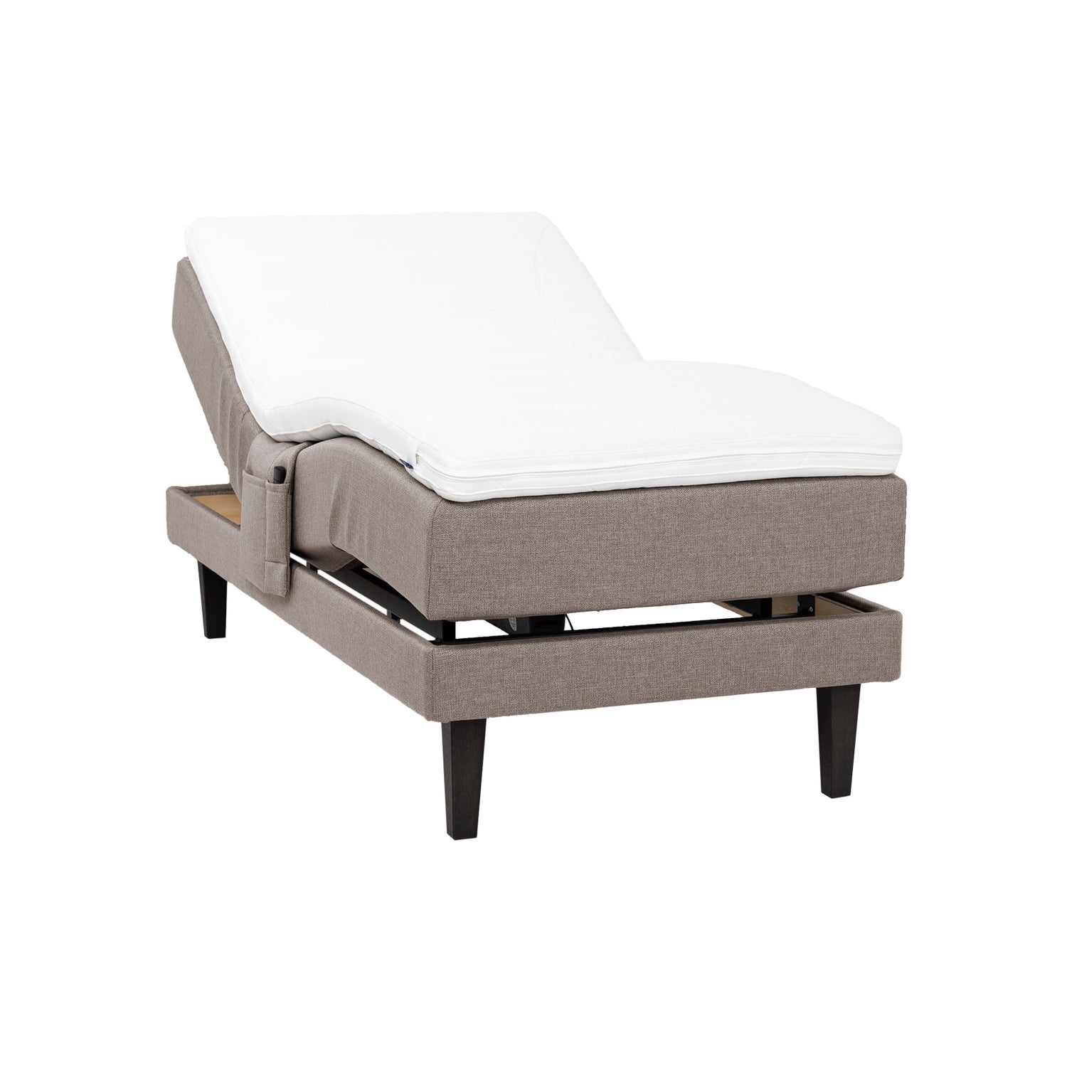 Hiekanvärinen Hilding Feel -moottorisänky 80 x 200 cm hiilenmustilla 23 cm Royal-tammijaloilla ja Hybrix Air Coolmax -sijauspatjalla. Kuvan tarviketasku myydään erikseen.