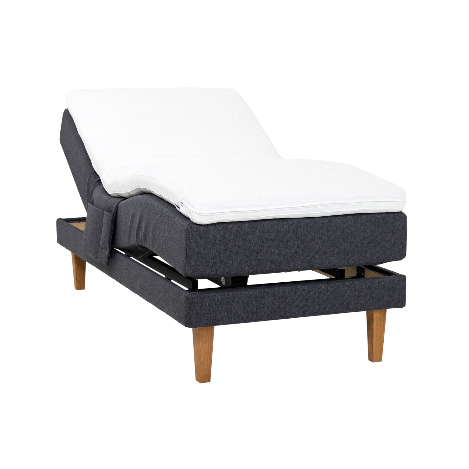 Antrasiitinvärinen Hilding Original -moottorisänky 90 x 200 cm luonnonvärisillä 23 cm korkeilla Royal -tammijaloilla ja profiloidulla kimmovaahtosijauspatjalla. Kuvan tarviketasku myydään erikseen.