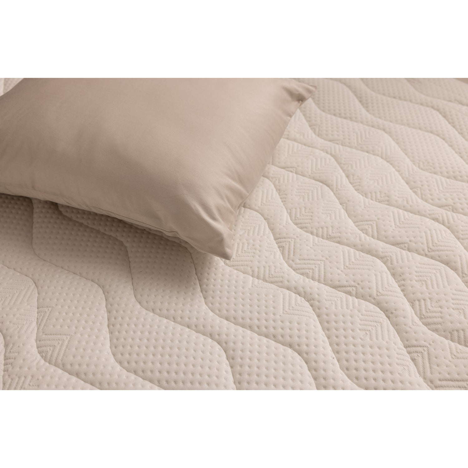 Lähikuvassa Jensen Sleep 1 -sijauspatjan päällisen pintaa. Sijauspatja on suunniteltu käytettäväksi Jensen-patjojen kanssa.