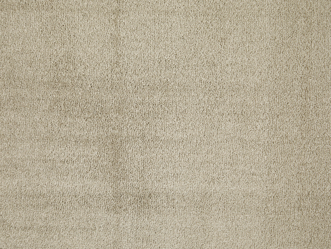 Julian taipuisa nukkapinta tuntuu ihanalta paljaan jalan alla ja tekee matosta eläväisen näköisen. Kuvassa beige väri.