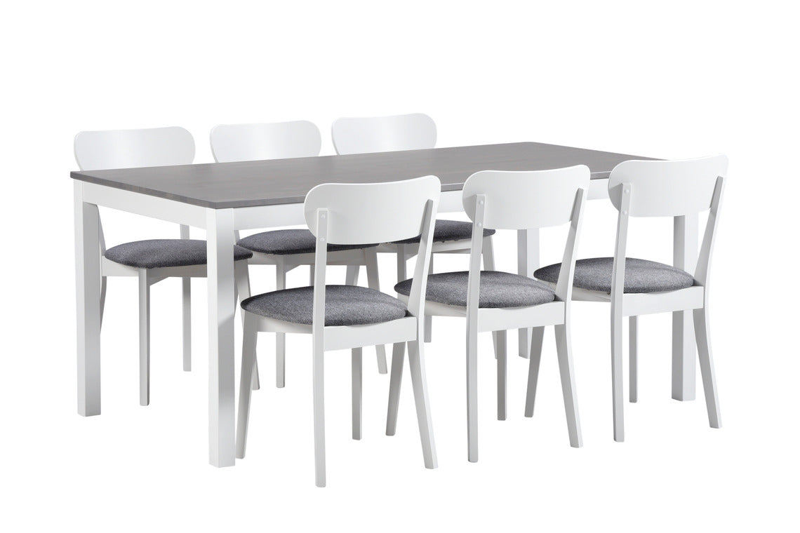 Harmaakantinen Kaisla-pöytä ja Laine-tuolit harmaalla istuinverhoilulla.
