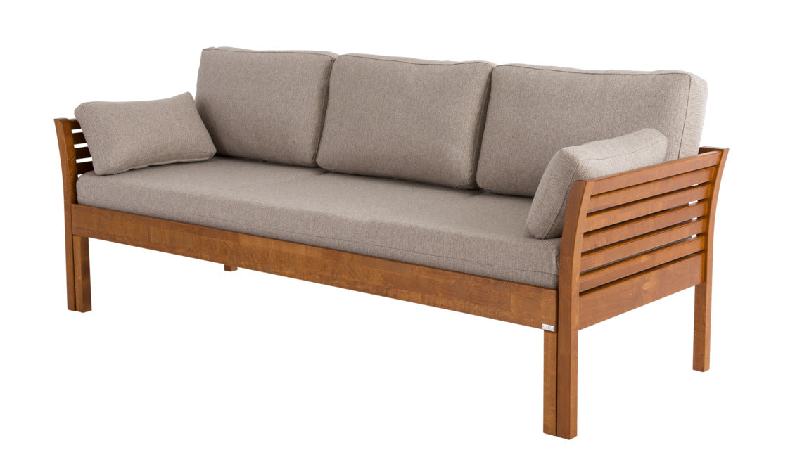 Pähkinänvärinen Kanerva- puusohva ja beige Levon-taittopatjasarja. Patjasarja myydään erikseen.