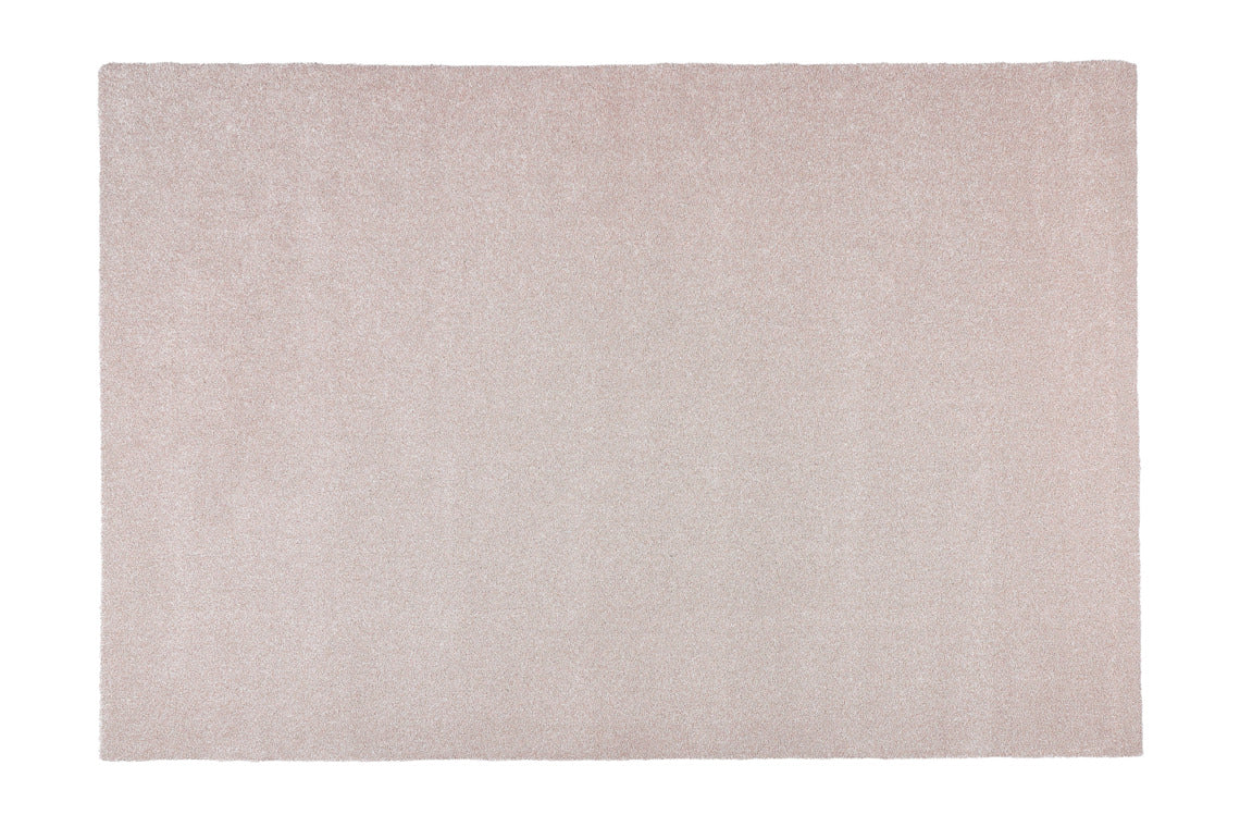 Tiheänukkainen Kide-matto beigen värisenä.