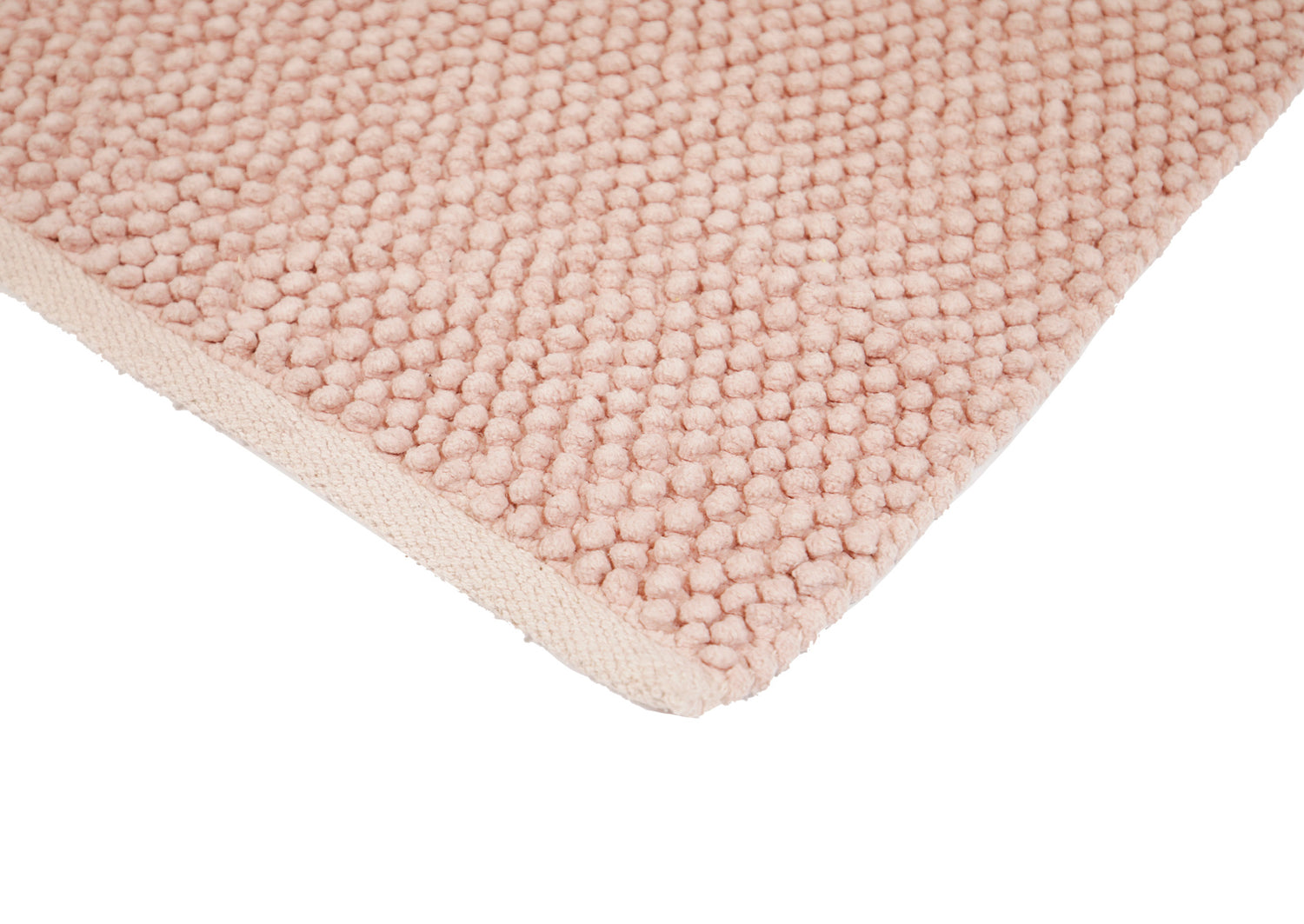 Pehmeä Olivia-matto roosanvärisenä. Puuvillamatossa on pampulapinta ja liukumaton pohja.