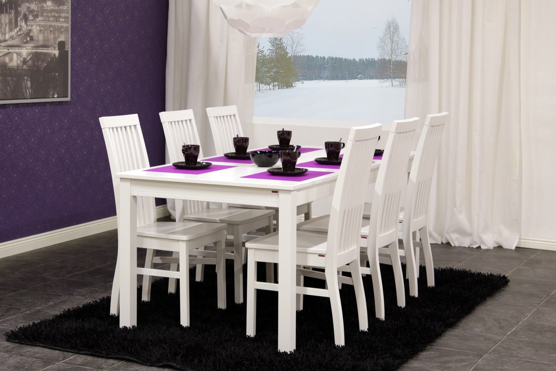 Valkoinen Petra-ruokailuryhmä. Petra-ruokapöydän koko on 175 x 90 cm.