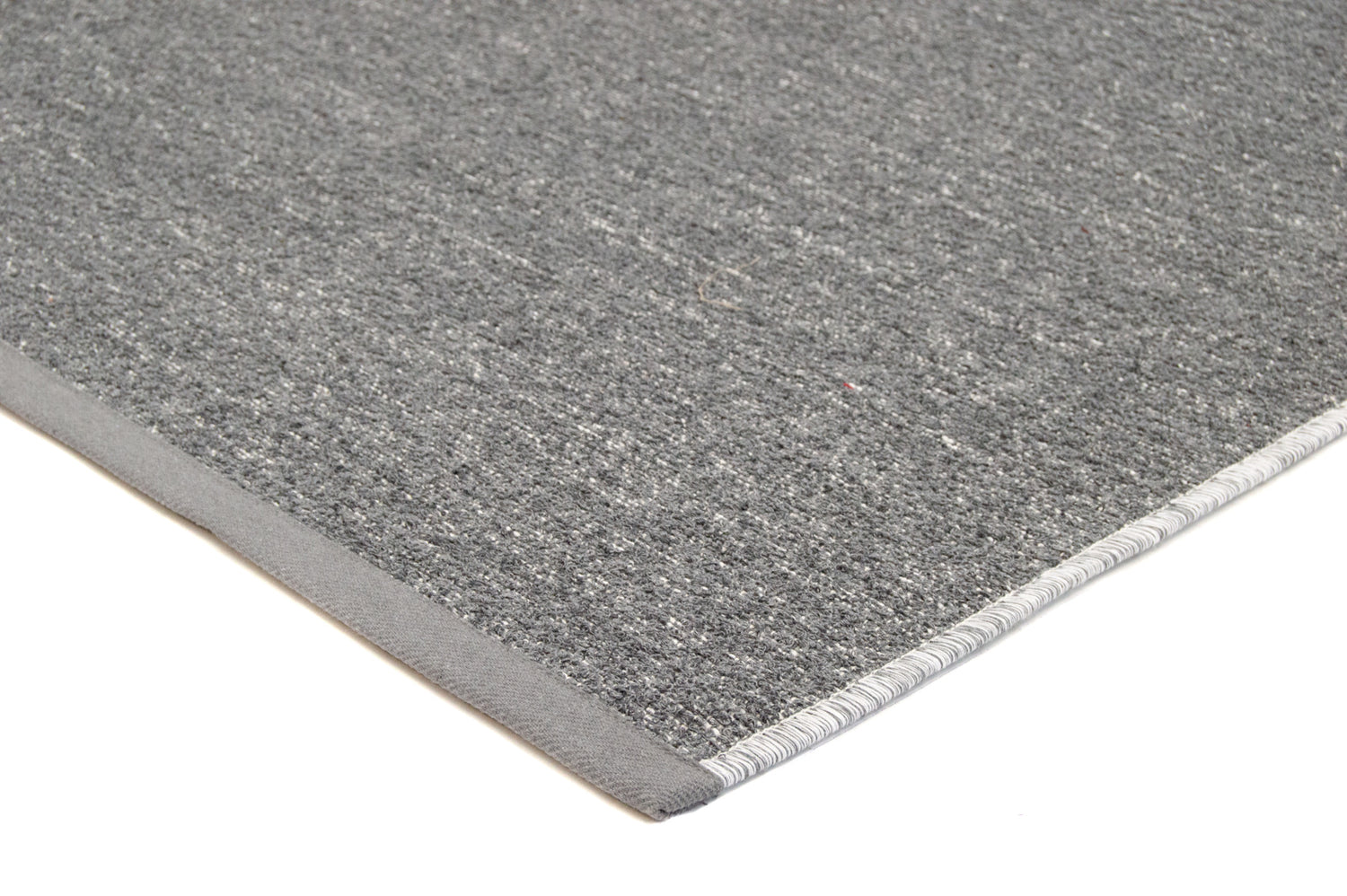 Lähikuva harmaasta Saima-puuvillamatosta.