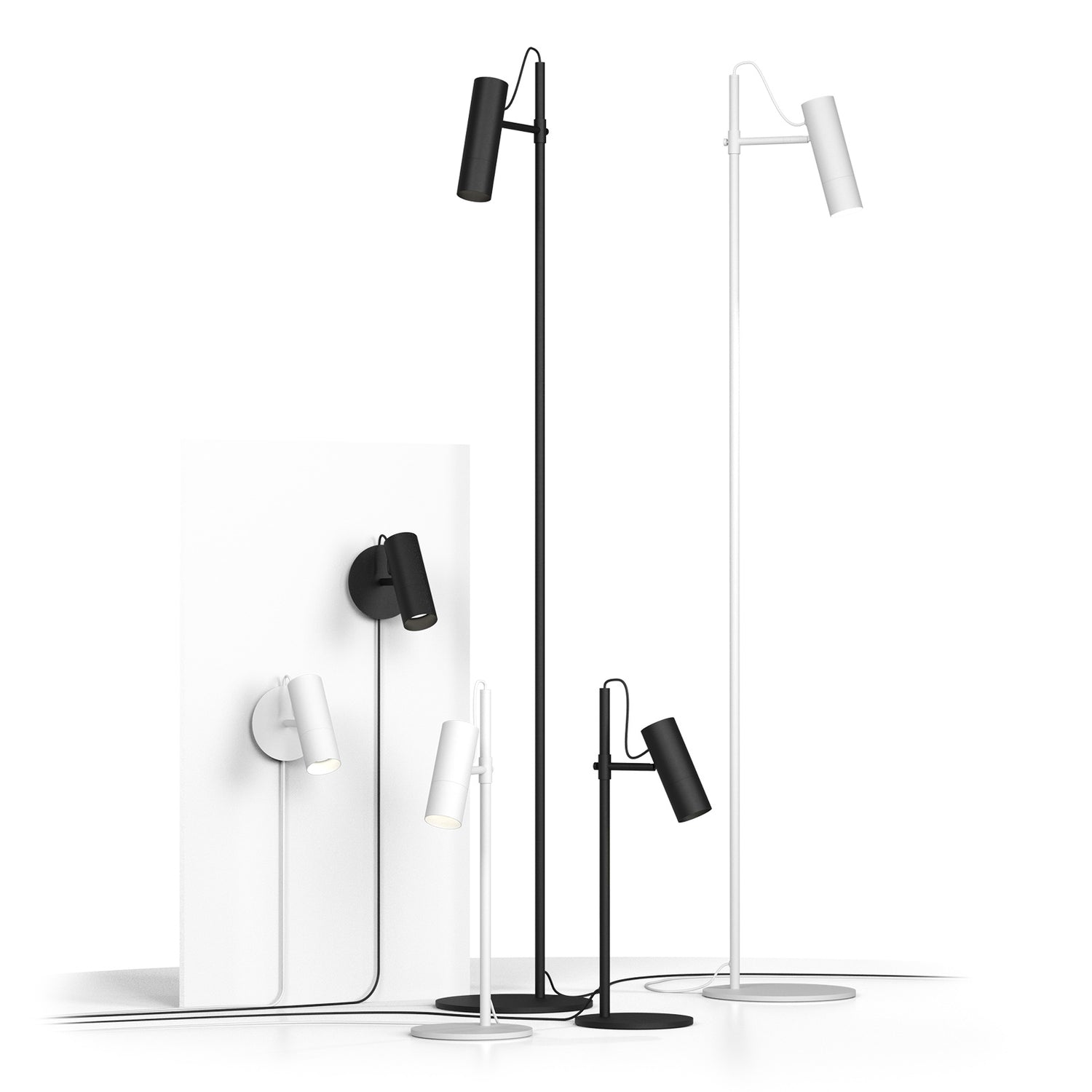 Kuvassa on Spot-sarjan valaisimia mattamustana ja mattavalkoisena. Spot-valaisinsarjaan kuuluu pöytävalaisimen lisäksi seinä- ja lattiavalaisin.