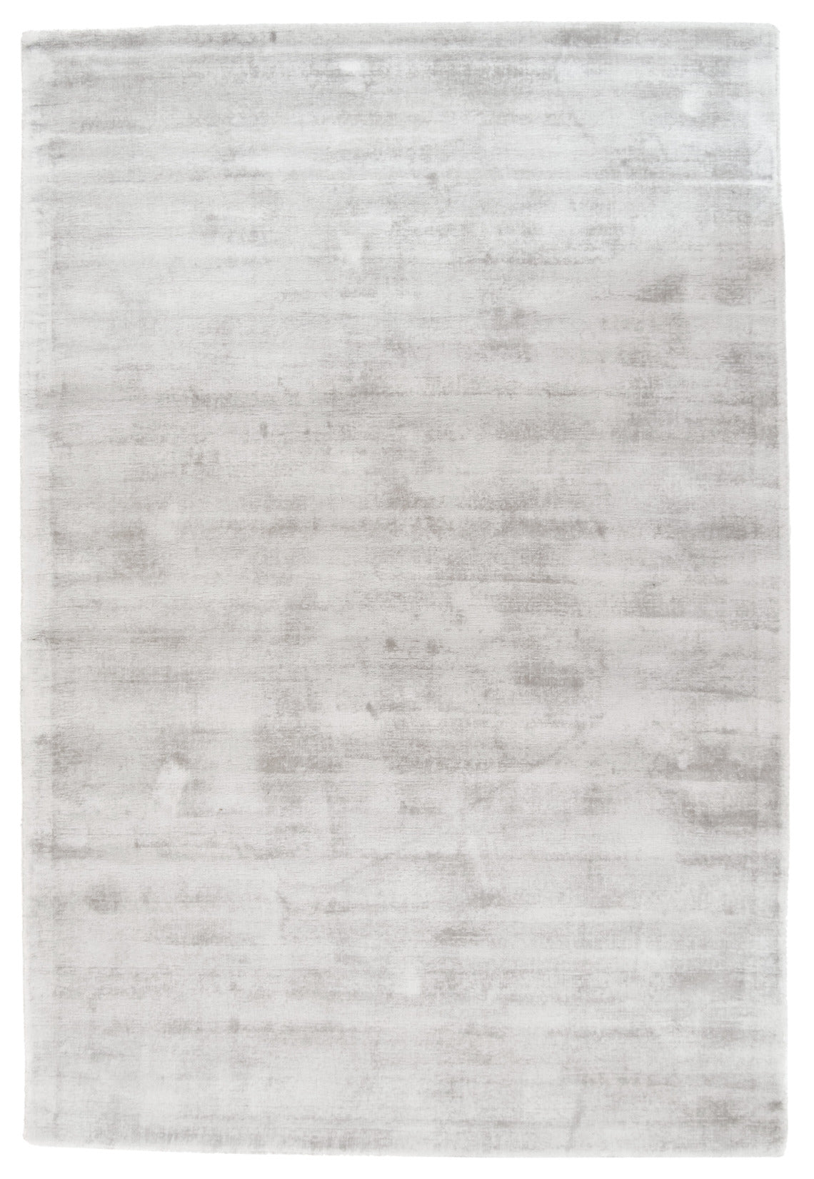 Hopeanvärinen Välke-matto. Vaaleasävyisessä matossa on lyhyt valoa taittava nukka.