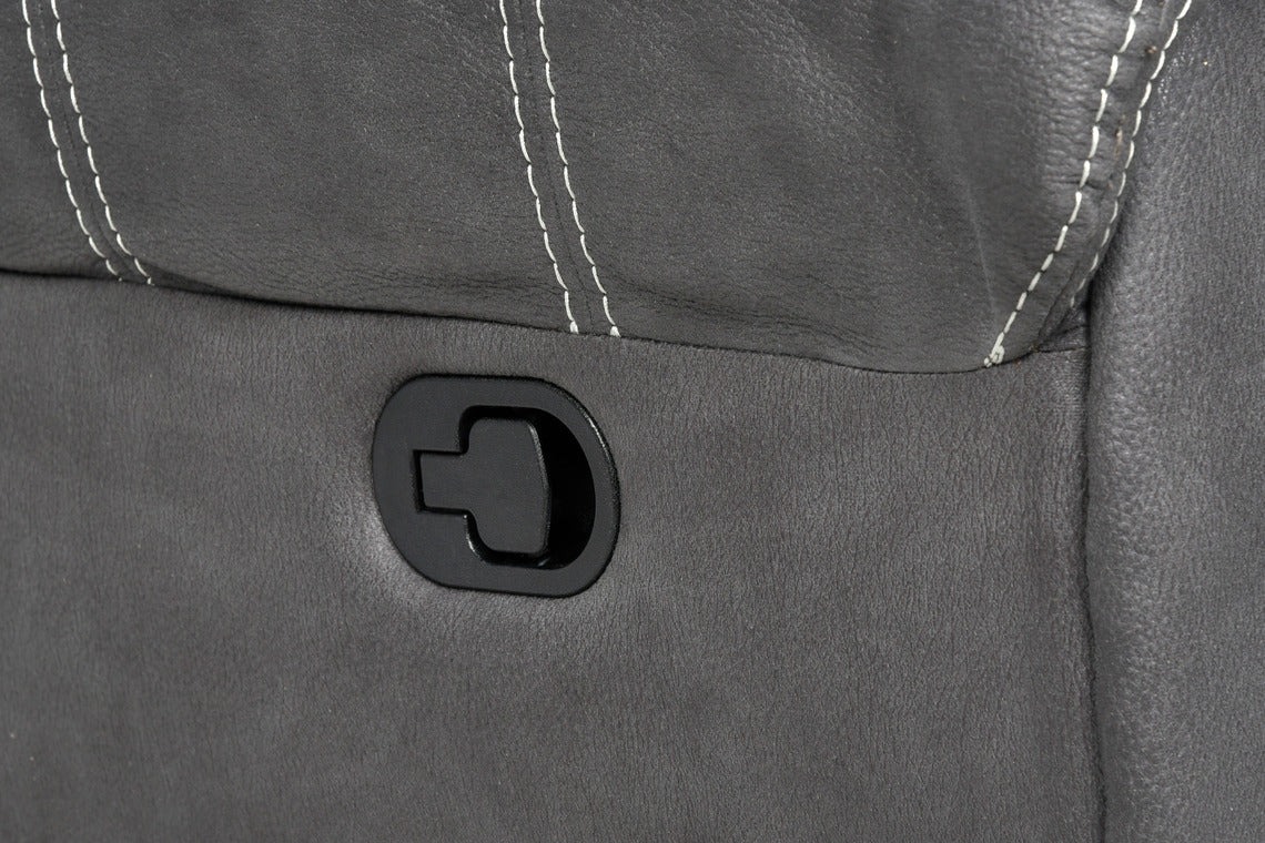 Päätyosan selkänoja kallistuu ja jalkarahi nousee sivussa olevalla manuaalisella laukaisukahvalla.