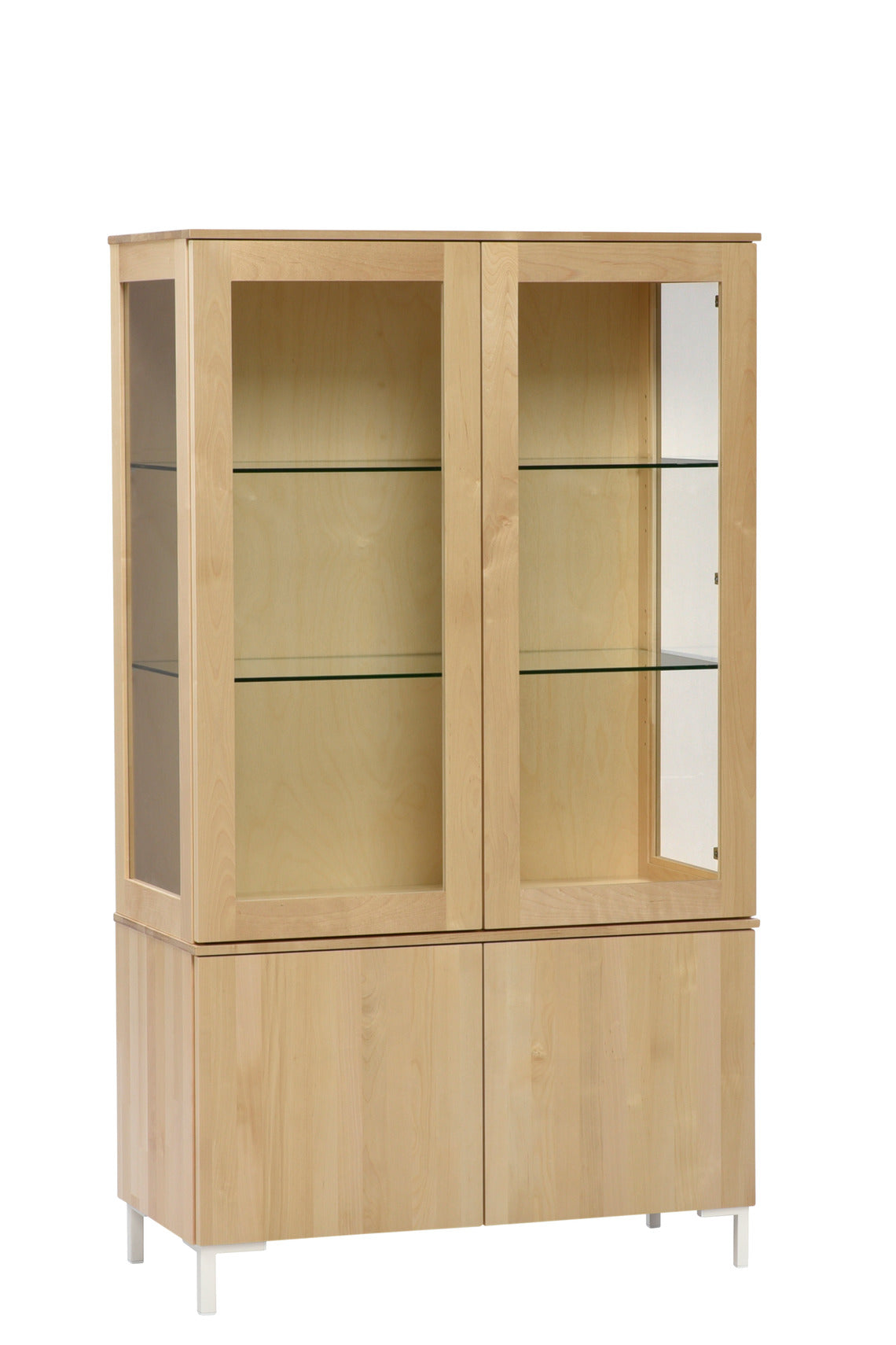 Pyökinvärinen Helsinki-vitriini valkoisilla metallijaloilla.