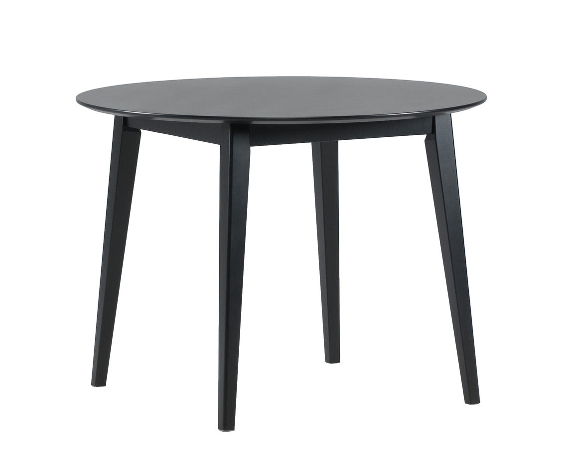 Pyöreä Laine-ruokapöytä kokonaan mustana.