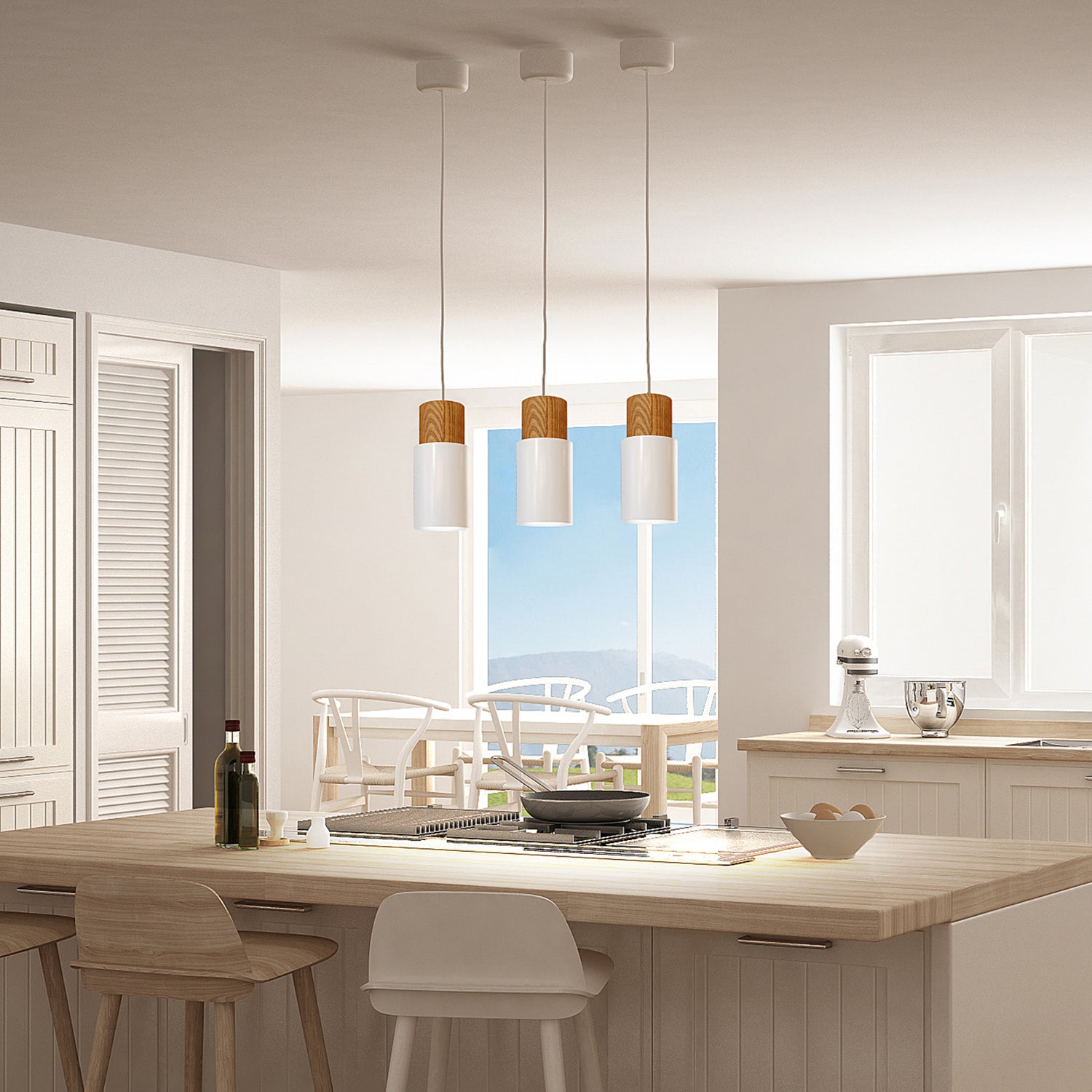 Log on Design by Grönlundin kattovalaisin, jota on kolmea eri kokoa. Kuvassa on pienimmät Ø 10 cm valkoiset Log-valaisimet useamman valaisimen rivissä keittiön saarekkeen päällä.