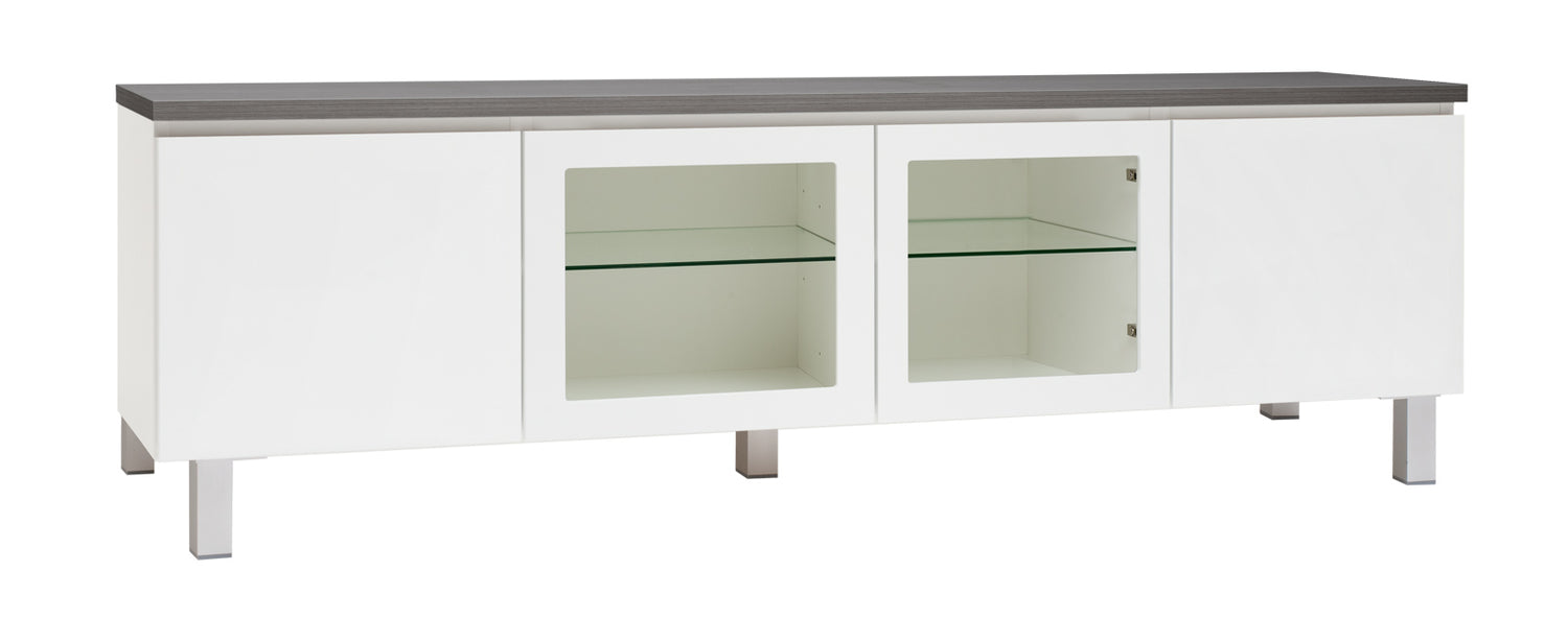 Kuvassa on 184 cm leveä valkoinen Viiva-sarjan tv-taso antrasiitinvärisellä kannella ja hopeanvärisillä alumiinijaloilla. Kuvasta poiketen tasossa on keskellä yhtenäinen tila ilman väliseinää, 88 cm leveällä lasihyllyllä.