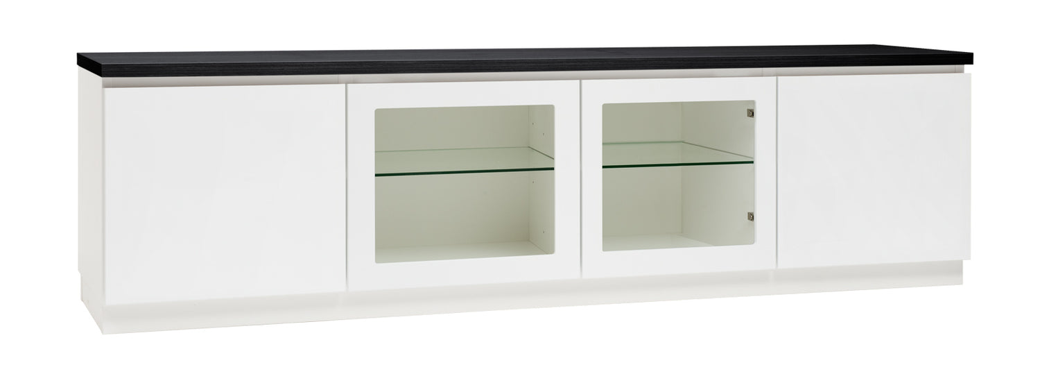 Kuvassa on 184 cm leveä valkoinen Viiva-sarjan tv-taso mustalla kannella ja valkoisella jalkasokkelilla. Kuvasta poiketen tasossa on keskellä yhtenäinen tila ilman väliseinää, 88 cm leveällä lasihyllyllä.