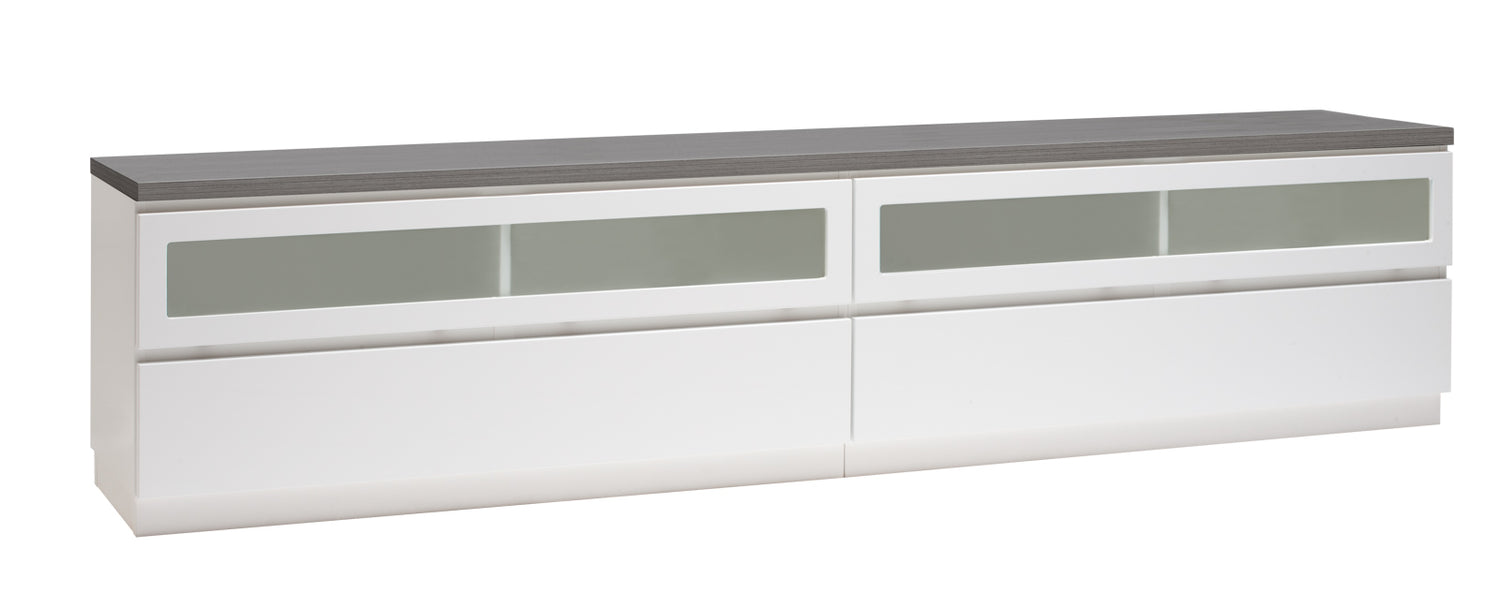 Kuvassa on 220 cm leveä valkoinen Viiva-sarjan tv-taso antrasiitinvärisellä kannella ja valkoisella jalkasokkelilla.