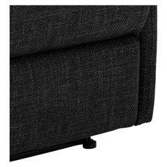 Lähikuvassa Sanderson recliner-nojatuoli, tummanharmaalla kangasverhoilulla.
