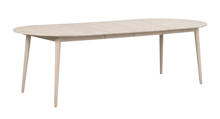 Tyler-ruokapöydän jatkolevy 40 cm, valkotammi, kuvassa 2 erikseen myytävää paikalleen asennettuna. Sopii ovaaliin Tyler-ruokapöytään.
