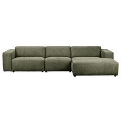 Neljän istuttava Willard-divaanisohva oliivinvihreällä Brenda (#77)-kankaalla. Divaani oikealla.