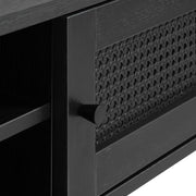 Lähikuvassa on Pensacola-tv-taso, musta. Tason ovissa on yksityiskohtana polyrottinki.