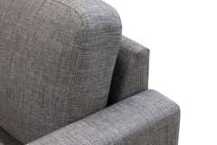 Lähikuvassa Ancona L 3 -sohvan harmaaanruskeaa Tuuru Basic 489 -kangasverhoilua.